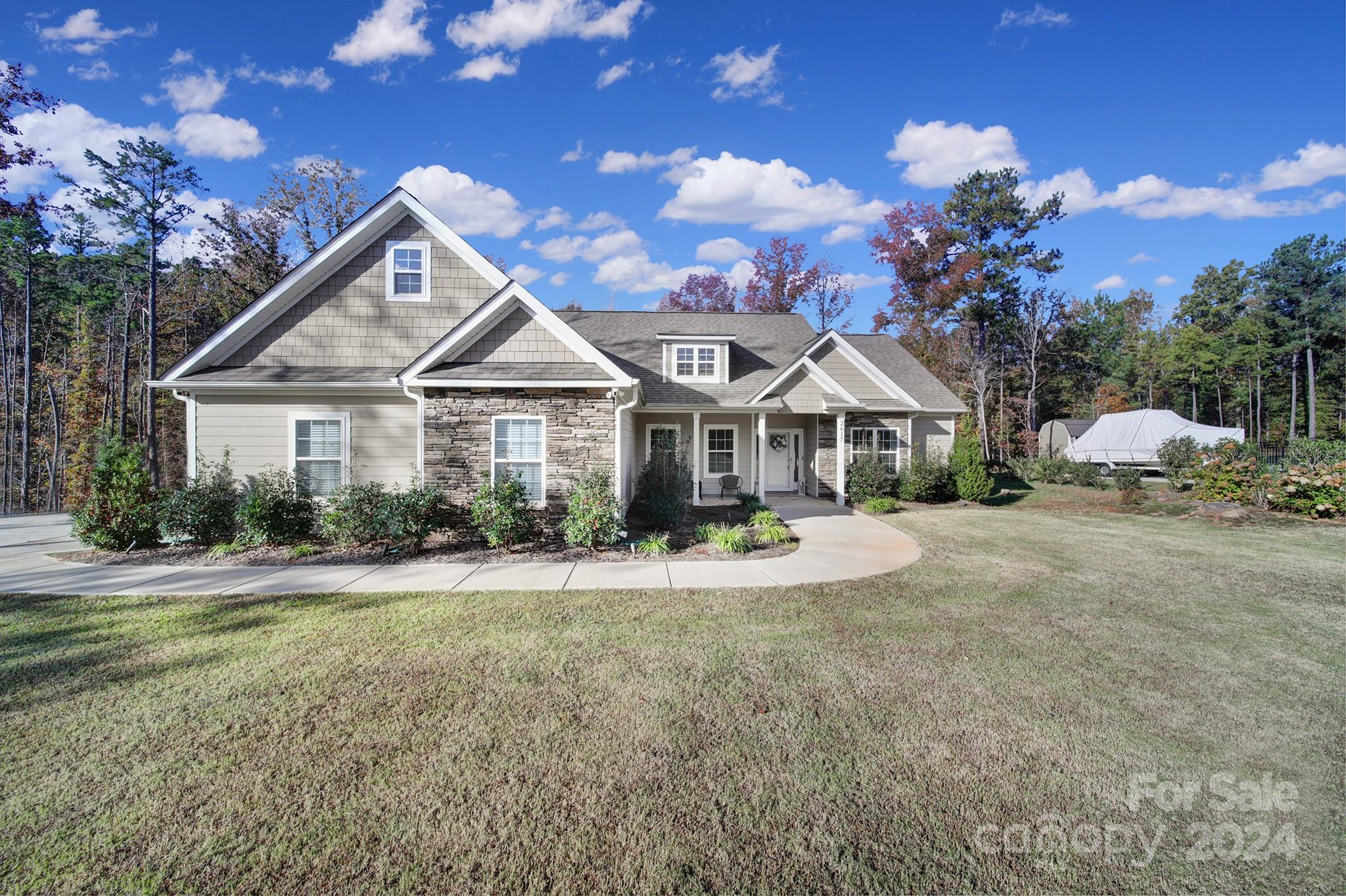 Welcome Home! This beautiful home has all you need. As you pull in, you are greeted with an oversized yard and almost an acre. You will love enjoying the welcoming front porch to sit and enjoy coffee in the mornings. As you enter, the open floor plan is perfect for entertaining. There is a formal dining room and could also be used as a great office space. In the kitchen, the stainless steel appliances and granite countertop with an over hang is perfect for a breakfast spot or afternoon snacks. You will love the split floor plan as well, with the primary being tucked away with double closets. The oversized rooms will be perfect for your needs. As you venture outside, the screened in porch will be the perfect spot for relaxing as you look into the beautiful trees in the backyard for privacy. Come see all this stunning property has to offer! Book your showing today!