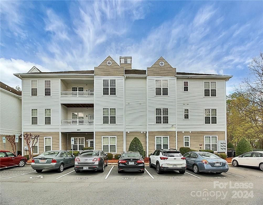Dont miss this opportunity to live in a highly desired area close to everything Cornelius and Huntersville have to offer. This lovely 2 bed, 2 bath, first floor condo with balcony will enable you to stroll the tree lined streets to restaurants and the community pool and recreation area. Nice open floor plan with fireplace with electric logs. Kitchen has wonderful counter space, pantry and a bar for eating. Master suite has trey ceiling and walk-in closet and spacious bath. Secondary bedroom is also spacious. Patio has a gate and shielded by a hedge. This is just waiting for your inspection. Pets are conditional (strict 30 lb maximum weight limit). Resident liability insurance is required.