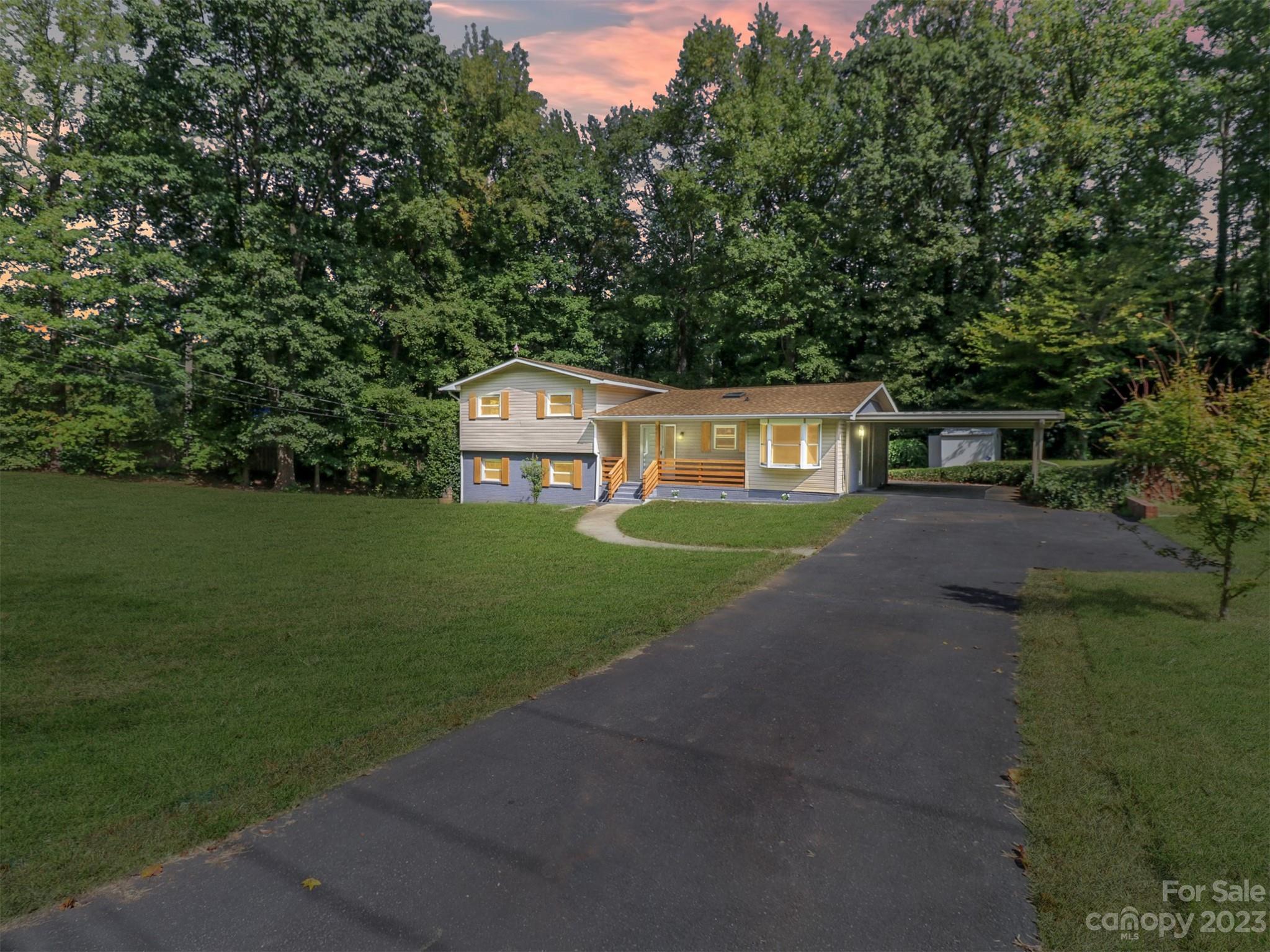 Beautifully home in established neighborhood on East Charlotte. This home offers 4 bedrooms, 3 full bathrooms, a bonus room, a patio, and it feels so spacious!  You could use the lower level as a mother in law suite or for some extra income because it has it's own entry. Huge lot it feels super ample and it's adjacent to Delta Creek Park which offers trails, picnic area, grills, playgrounds, and much more! This home is fantastic to entertain and to enjoy the outdoor space. The backyard faces mature trees and the park to the left. You will feel far from the city. Come check it out!