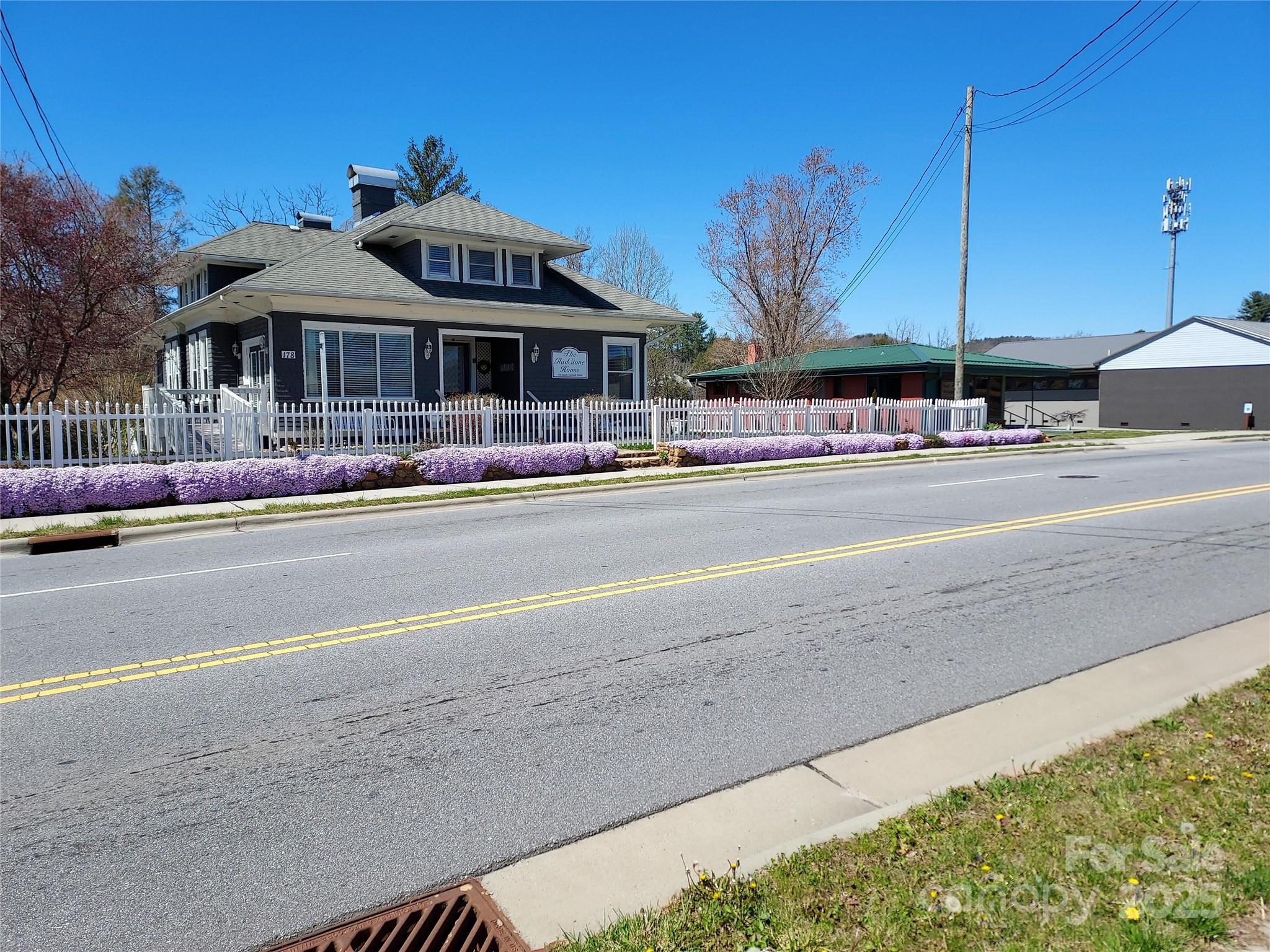 Rare Opportunity Brevard, NC Prime commercial property-Historic Home-Event Venue-Airbnb This unique historic house/property is situated 2 blocks south of Main St in beautiful downtown Brevard. Attractively updated to maintain and add to the charm of this historic home. The property features 3 levels for residential and commercial use. The main level is an open and elegantly decorated event space. Host weddings, showers, anniversaries, retirement, birthdays, celebrations of life and much more. The upper and lower levels are separate apartment units available for S/L rent or residence. Providing a live/work and rental space. In the backyard you will discover a lush, enchanting garden, covered patio, pond, flag stone patio, garden shed/greenhouse off street parking.