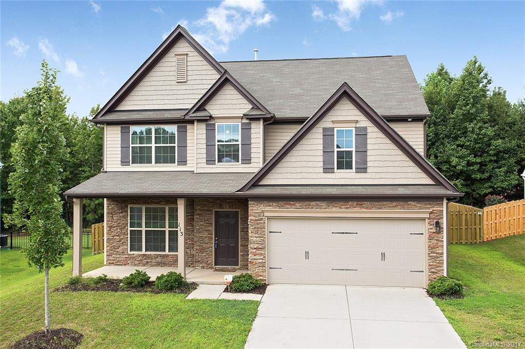Spacious home in newer subdivision. Large and flat fenced back yard. First floor features Great Room with gas fireplace. Kitchen has upgraded cabinets, granite countertops with tile backsplash, SS appliances and bar area. Bedroom on main level with full bath. Upstairs is a large loft, two spacious bedrooms and large master bedroom with trey ceiling. Master bath has dual vanities, tub and shower. Great curb appeal with stone accents and stamped carriage style garage door!