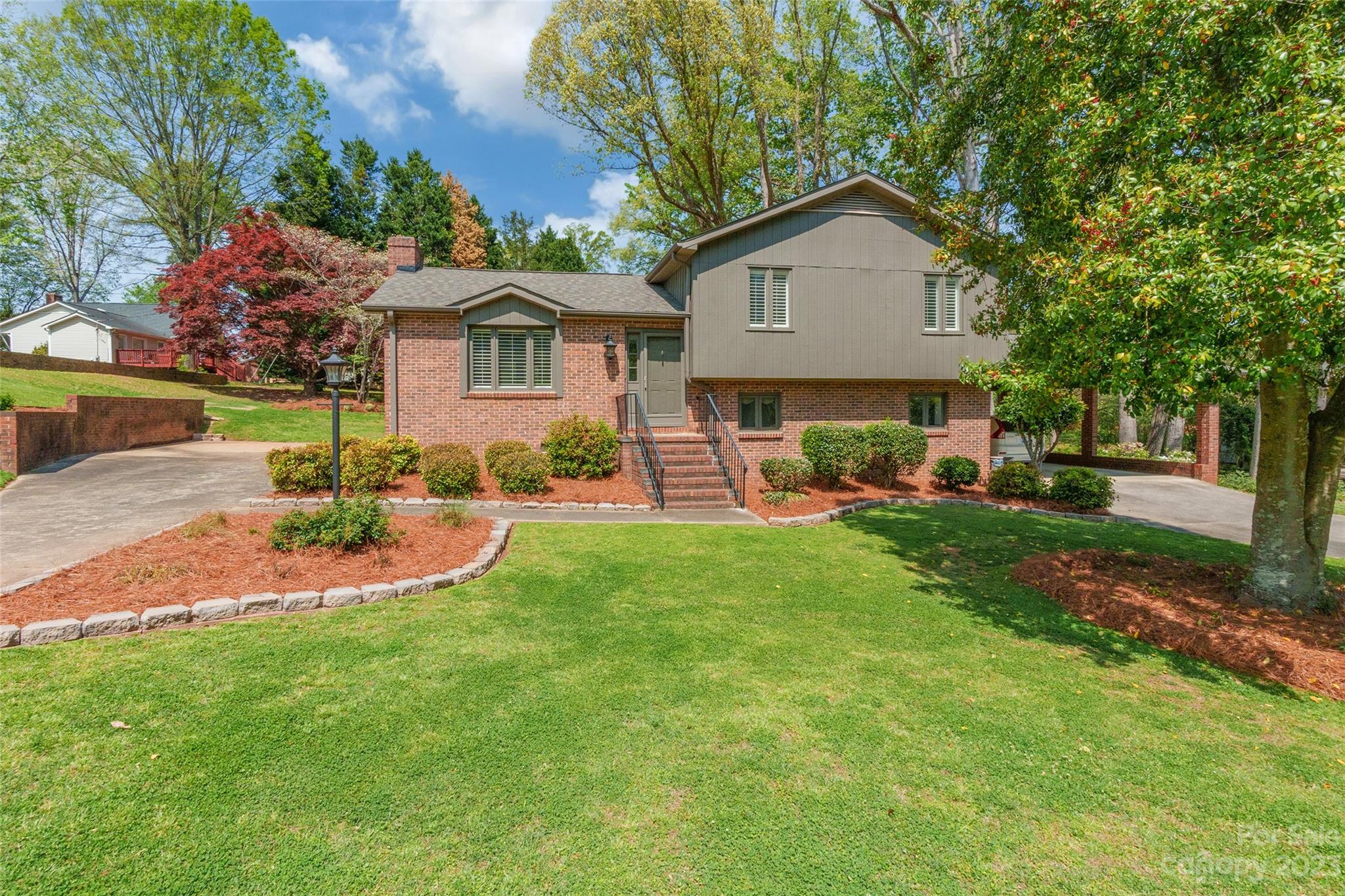 Well-maintained split-level home with 3 bedrooms, 3 full bathrooms, and plenty of charm! No HOA, a double lot, and located centrally in Rock Hill city limits, this property is subject to county taxes. Two sheds out back (one wired) and a deck overlooking the large yard make enjoying the outdoors easy. This home has beautiful floors and plenty of space to enjoy inside like a sitting area, mini bar, and formal living and dining rooms. This house is ready to be made yours!
