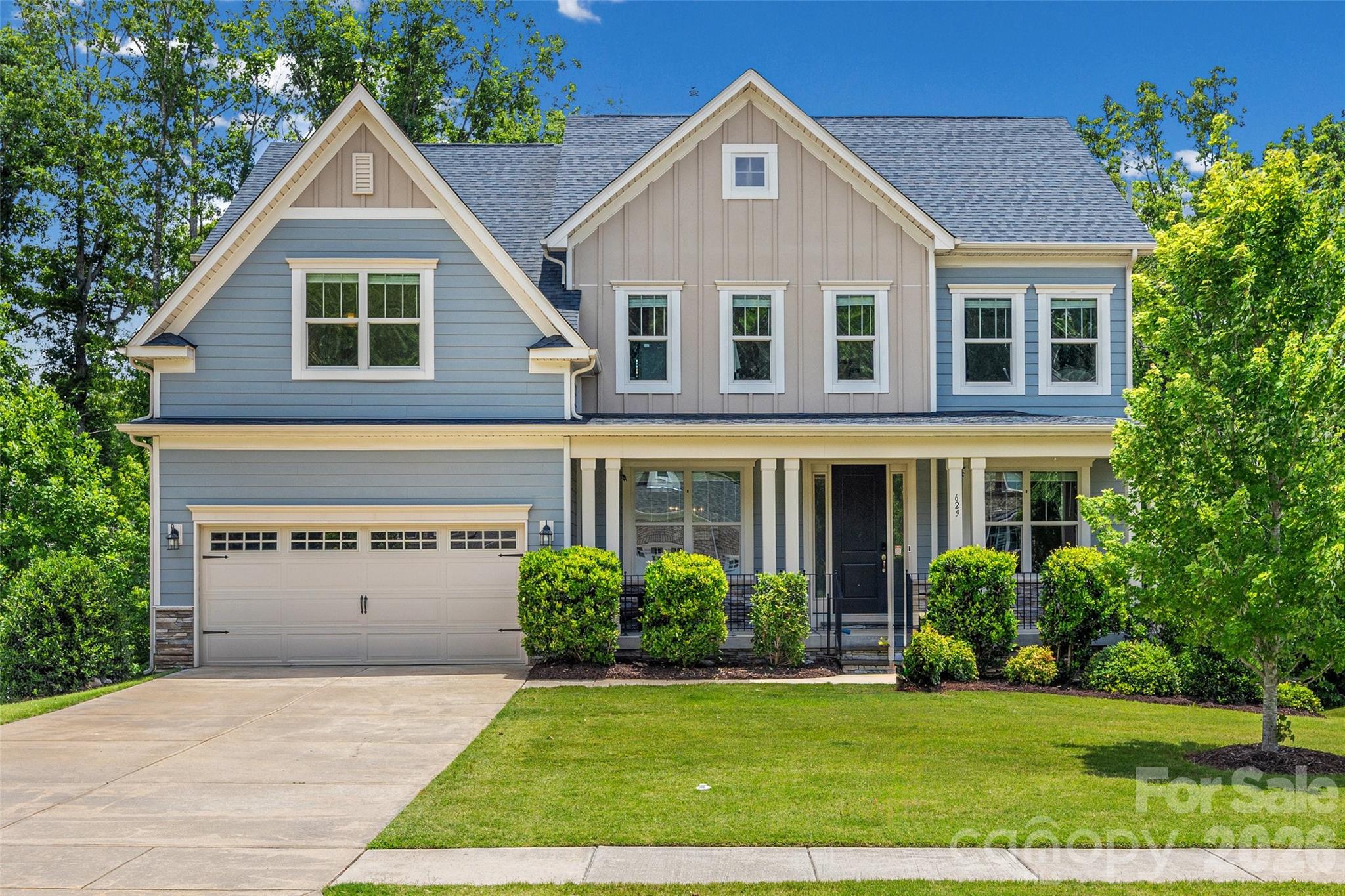 Exceptional Home in Indian Land!
Welcome to 629 Cornell Drive, where luxury, space, and outdoor living come together on a private wooded homesite in one of Indian Land's most sought-after communities. This impressive 6-bedroom, 5-bath home offers a finished basement, award-winning schools, and the benefit of low South Carolina taxes.
Designed for both everyday living and entertaining, this home is loaded with thoughtful upgrades and improvements. The showstopper is the incredible 240-square-foot EZE-BREEZE porch featuring a tongue-and-groove ceiling, composite decking, recessed lighting, and views of the private backyard. Step outside to enjoy the expansive paver patio, additional composite deck, and fully fenced yard backing to mature woods, creating the perfect outdoor retreat.
One of the home's most valuable upgrades is the whole-house 21kW Generac standby generator. Installed in 2021, this system features five automatic load-balancing controllers servicing the home's major systems, including three HVAC units, the dryer, and oven. This premium feature provides comfort, convenience, and peace of mind year-round.
The 2023 Hot Springs Envoy hot tub also conveys and creates the ultimate backyard oasis. This top-of-the-line 5-person spa from the Highlife Collection features a saltwater system, included steps and cover, and has been protected under roof since purchase. Whether you're entertaining guests or relaxing after a long day, this luxury addition elevates the outdoor living experience.
Inside, you'll find spacious living areas, a beautifully remodeled pantry with custom floor-to-ceiling shelving, a finished basement, custom office cabinetry, smart home features, and room for everyone. Additional highlights include a radon mitigation system, smart thermostats, Bosch dishwasher, overhead garage storage, extensive electrical upgrades, and a security system with cameras.
Whether you're hosting family gatherings, relaxing in the hot tub, working from home, or simply enjoying the peace and privacy of your wooded backyard, this home offers the perfect combination of comfort, functionality, and lifestyle. This is one you won't want to miss!
