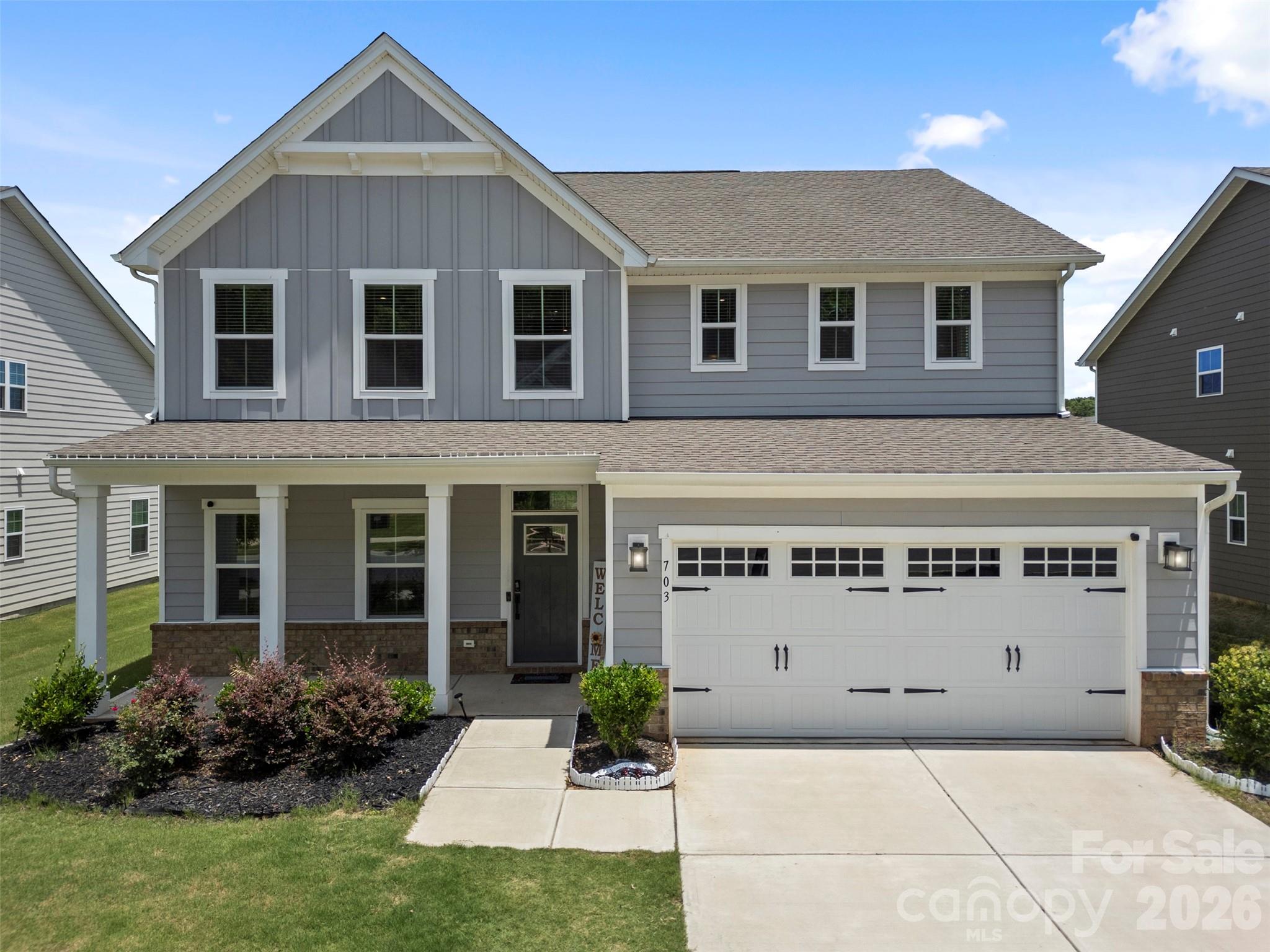 Located in the highly desirable Springshire Creek community, this beautifully maintained 5-bedroom home is situated within the top-rated Porter Ridge school district and offers an unbeatable location just minutes from I-485, US Hwy-74, Costco, Walmart, shopping, dining, and more.

Filled with natural light, the open-concept floor plan features a stunning white kitchen with a huge center quartz island, stainless steel appliances, upgraded soft-close cabinetry, gas cooktop and oven, and seamless flow into the family room with a cozy gas fireplace. Upgraded metal balusters add a modern touch to the staircase.

The main level includes a private office with French doors and a guest suite with a full bath, making it ideal for multi-generational living, extended-stay guests, or added privacy for family members.

Upstairs, you'll find four additional bedrooms and an oversized loft perfect for a second living area, media room, playroom, or entertaining space.

Additional upgrades include a Tesla EV charger and a Leaf Water Solutions whole-house water filtration system for added convenience and peace of mind.

Step outside through the sliding glass doors to enjoy the expansive backyard overlooking a peaceful pond, offering the perfect setting for entertaining, or relaxing in the cool evening breeze.

This move-in-ready home combines space, style, thoughtful upgrades, and an exceptional location in one incredible package. Schedule your showing today!