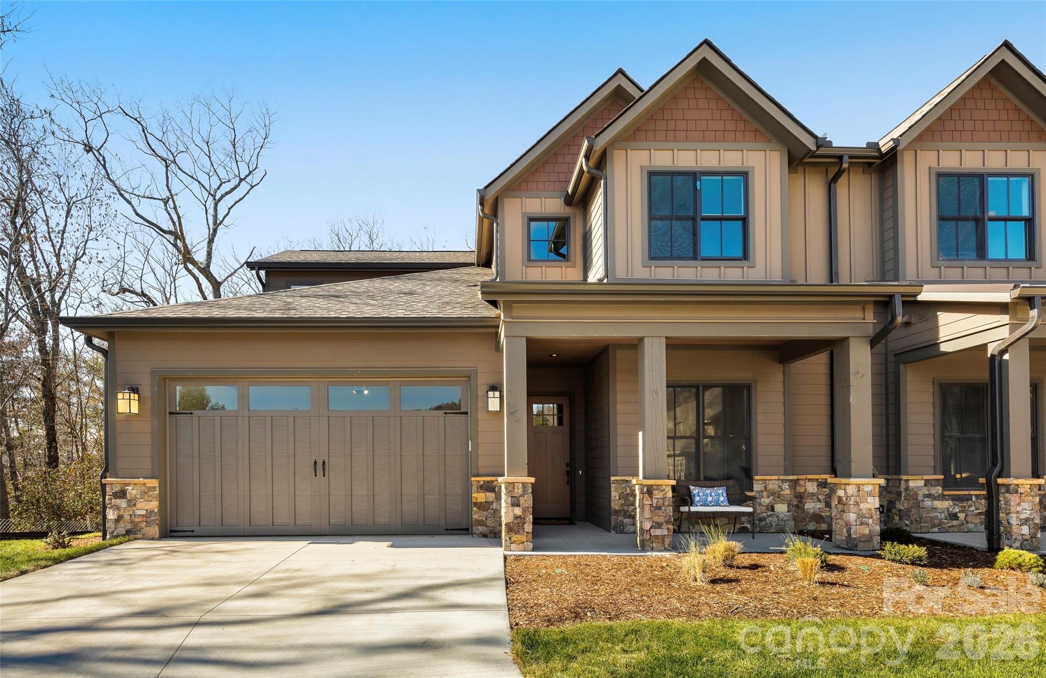 VIEWS from the front porch & privacy on the back patio! Nestled in the desirable community of Champion Hills, Chimney Crossing is an enclave of 14 villas. This spacious new construction features vaulted ceilings, a lock-and-leave concept, zero-entry on the main level, an open floor plan, & a large kitchen island for entertaining. The large covered porches are the perfect place to relax and enjoy the privacy & serenity of this hilltop location. Each home includes an office on the main level, allowing you to work in privacy while staying close to what is most important. Plenty of custom touches are included, such as Quartz countertops, epoxy garage floors, vented natural gas fireplaces, & the latest in wood flooring. All of this comes with Tom Fazio's Mountain Masterpiece—an 18-hole golf course, Har-Tru lighted tennis courts, pickleball, a Wellness Center, an outdoor heated pool w/hydro spa, walking trails, & so much more! This home is now complete and includes the 60k Membership Fee.