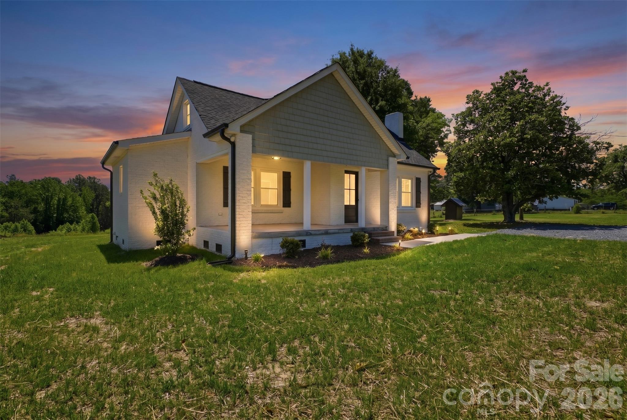 Completely remodeled down to the studs and move-in ready! This full brick home is tucked away on a large, over 1.2-acre lot in a quiet area and welcomes you with a spacious covered front porch that’s perfect for slow mornings and evening rocking chairs. Inside, you’ll find tall ceilings, abundant natural light from brand new windows, and clean modern finishes throughout. The comfortable layout offers 3 bedrooms and 2 full baths, including a newly added primary bath and utility room designed for everyday convenience. This home has been extensively updated with all new drywall, electrical, HVAC, insulation, plumbing, roof, septic system, and windows, giving you peace of mind for years to come. The all-new interior features fresh paint, new flooring, stylish cabinets and countertops, stainless steel appliances, and an electric fireplace that adds warmth and character to the living space. Bright, open, clean, and comfortable… this one feels like a brand new home while still offering the charm of an established setting.