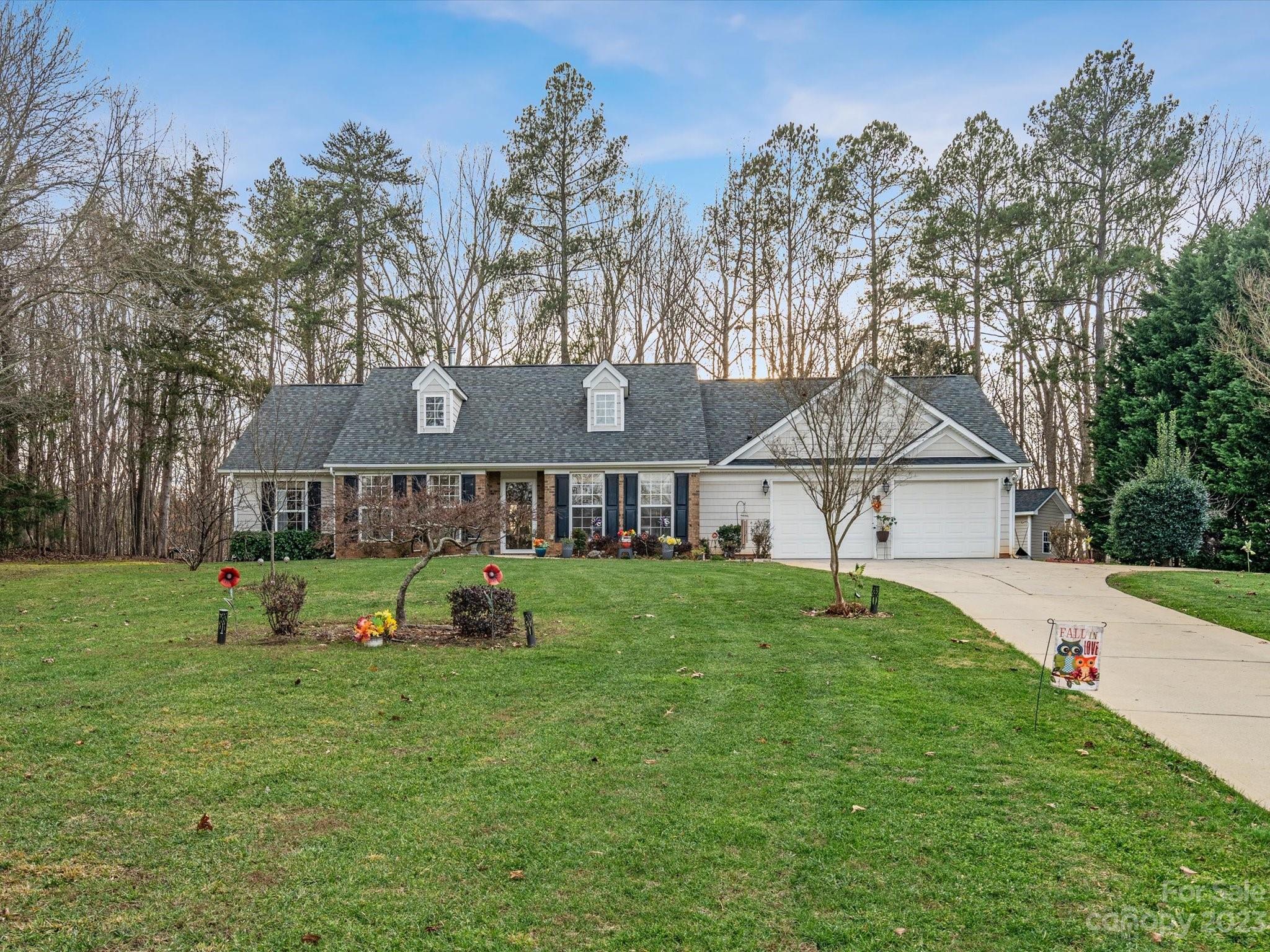Welcome to your dream home! This picturesque 3BD, 2BA residence is a haven of tranquility, situated on an acre lot in the heart of the countryside. Step inside where the seamless flow between spaces creates an inviting atmosphere and the sunlight dances through large windows and casts a glow on the wood floors adding a touch of elegance to the entire space. The living room's cozy ambiance is perfect for quiet evenings by the fireplace. The kitchen features granite and stainless appliances with plenty of counter space.  Enter the primary BR where comfort abounds with trey ceiling and tons of light. The  primary bath has double sinks, and separate shower. Step outside to the sprawling acre lot that provides privacy galore, creating an oasis for outdoor activities. Whether it's enjoying morning coffee on the patio or hosting summer barbecues, the backyard is a canvas for you to paint. This home offers a quiet escape from the hustle and bustle of daily life.
