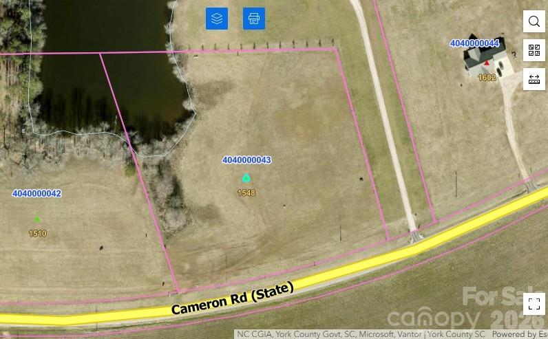 Flat waterfront lot with no HOA, offering the perfect opportunity to build your own dream home in a quiet, peaceful setting. The property provides a usable layout that allows flexibility for a variety of home designs, along with a 4-bedroom septic permit already in place, saving valuable time and upfront planning. Enjoy access to a shared pond, creating a scenic backdrop ideal for relaxing, fishing, or simply taking in the natural surroundings. With its level topography and thoughtfully positioned features, this lot offers both beauty and practicality. Hard to find and full of potential, this is a great opportunity for those seeking privacy, freedom from HOA, and the chance to create a custom waterfront home.