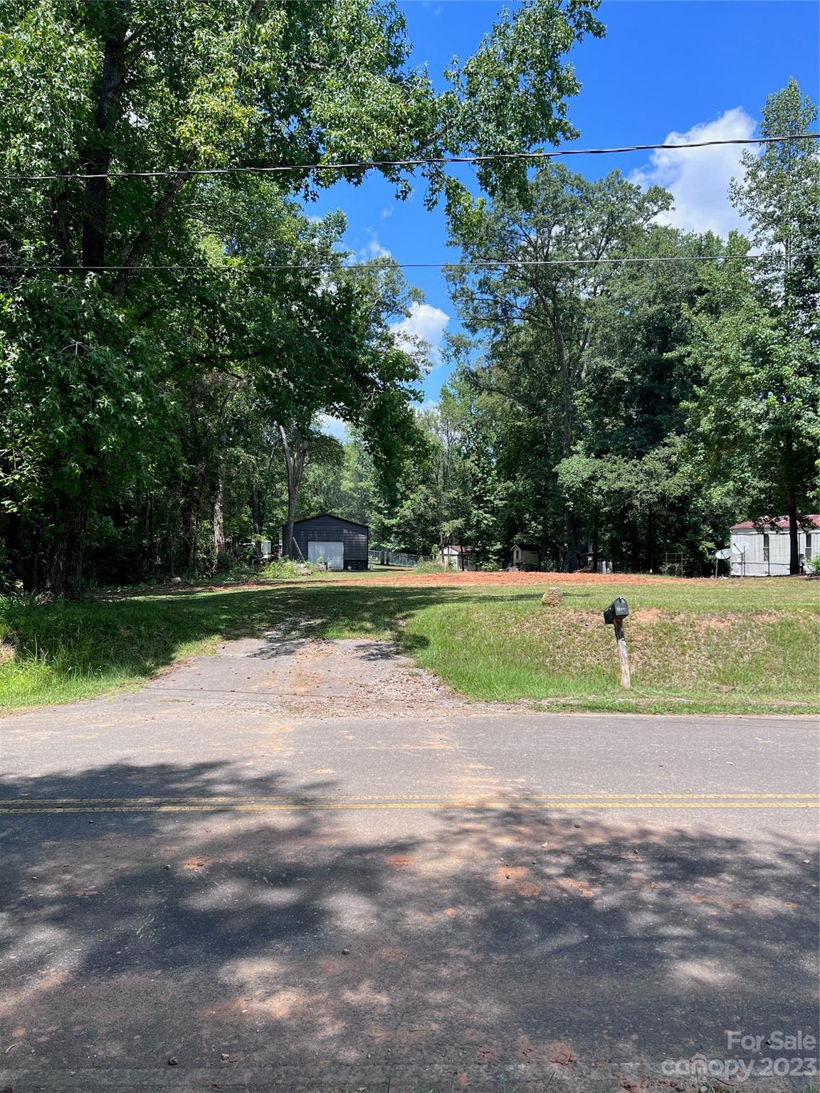 Ready to build your new home in Fort Lawn? This .66 acre lot is almost completely cleared and is ready for it's new homeowner! Located near the Catawba River/Fishing Creek Lake with water views from front of lot; lot is already set up for power and gas connection and has a well + brand new septic that is able to support a 4-bedroom house. Like new (~10 month old) 40 x 24 storage building does convey. **Please do not access property without a scheduled appointment by licensed South Carolina REALTOR.**