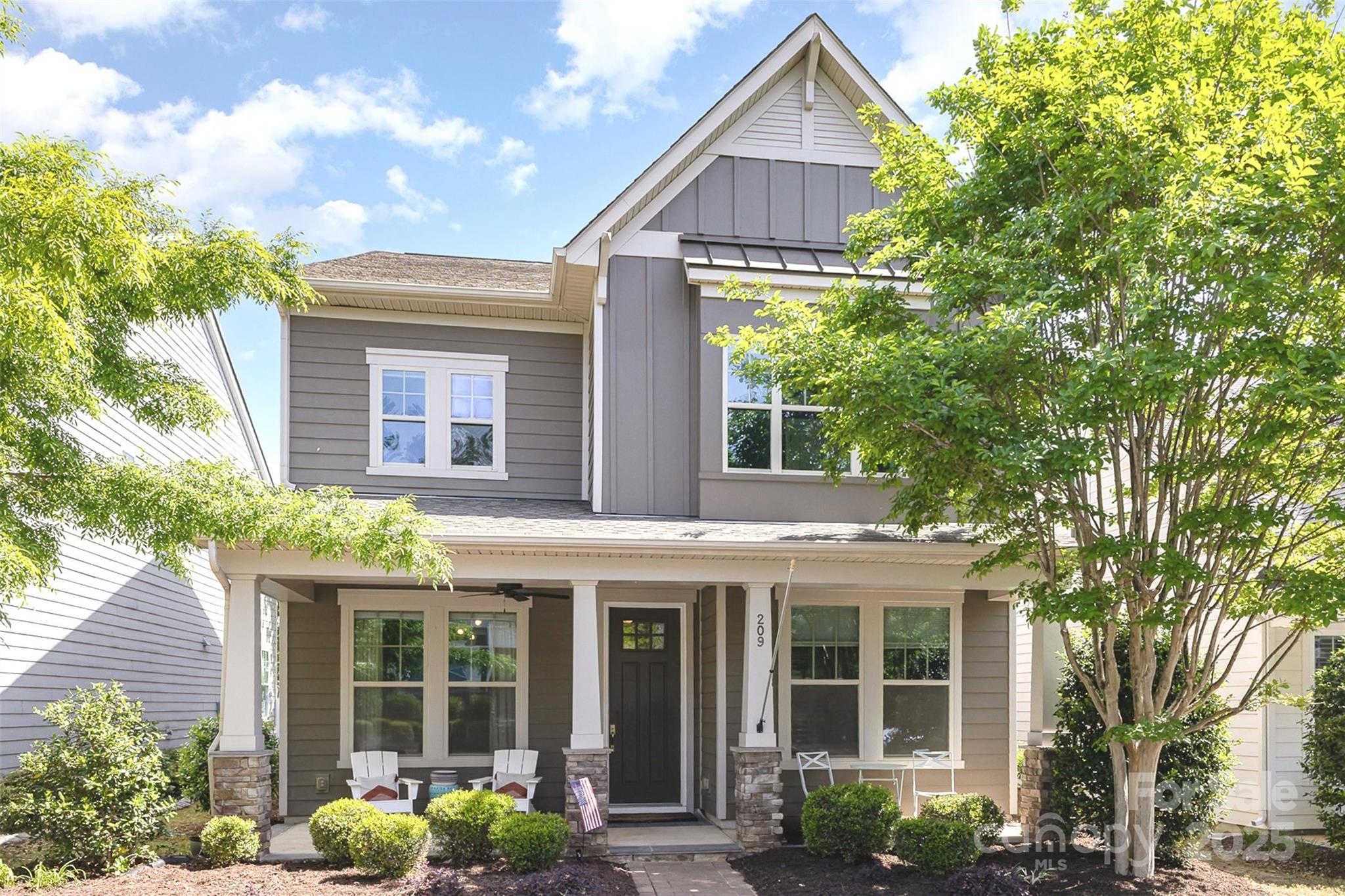 This move-in ready open floorplan is found in the popular Fort Mill community of Brayden. The Gourmet Kitchen features Upgraded Cabinets, Gas Cooktop, Oversized Kitchen Island, Stainless Steel Appliances, Under Cabinet Lighting, Custom Shelving in Walk in Pantry, Upgraded Granite Countertops & Tile Backsplash. Lots of Light comes through the Breakfast Room Windows overlooking the Professionally Landscaped Backyard and with access to the Screened Porch. There is a guest suite with a Full Bathroom on the Main Level. A Dining or Home Office look out into the Neighborhood. A Large Primary Bedroom w/Luxurious Bathroom includes Tile Surround Shower, Soaking Tub, Raised Vanities w/Granite and Large Walk In Closet w/Custom Shelving and Cabinetry. Spacious Secondary Bedrooms. Eight Foot Doors & Custom Window Shades throughout. Just walk across to the playground and Convenient to Dining/Shops, I-77, CLT Airport, Downtown Charlotte & more!
