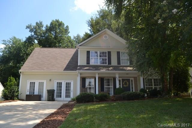 Fall in love from the curb! Lovely home was a former model that offers formal dining, open great room, & two bedrooms on 1st floor.  Updated kitchen has tons of counterspace, custom cabinets, stnls appls, & beautiful hardwoods thru-out main living areas. Huge master suite is vaulted and has large sitting area. Tons of space, perfect for the family who needs 5 BEDROOMS! Both HVAC replaced 2012, hardwoods 2010, and roof 2011.