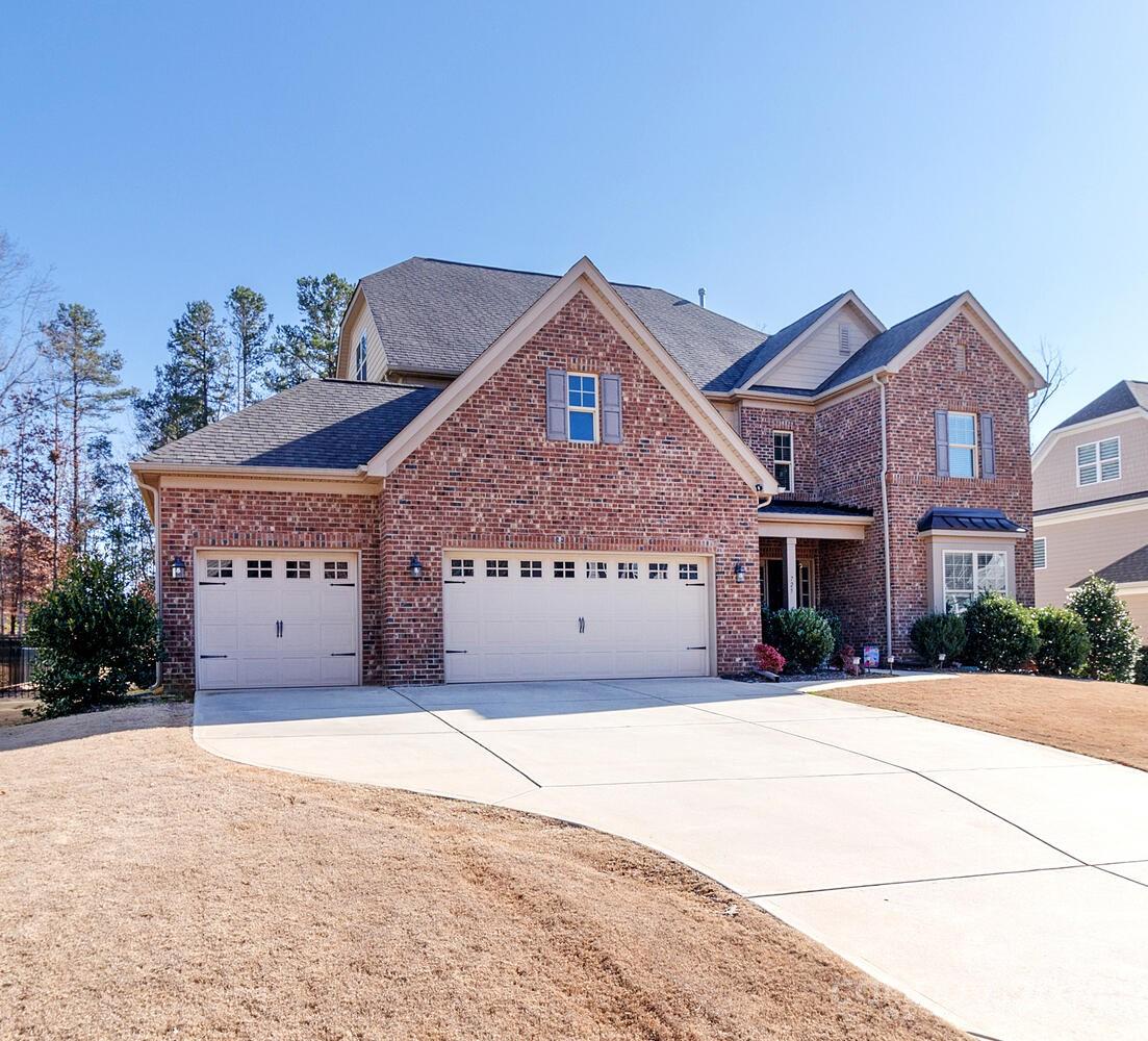 Absolutely beautiful Taylor Morrison home - Wonderful floorplan - hardwood flooring - guest suite on main - Large gourmet kitchen with massive kitchen island- Granite with tile backsplash - 5 burner gas cooktop - large double size walk in pantry - Kitchen opens to greatroom and dining area PLUS has dining room with builtins - Sunroom off kitchen  - Office nook- drop zone - Primary suite has 2 walk-in closets - Luxury primary bath with oversized shower  - Large loft - 3rd floor could be 5th bedroom or large bonus room - Private bath - All this plus a beautiful covered back porch with fireplace  and a fenced in yard and trees for privacy- Inground irrigation - Show this home and you will be glad you did!!