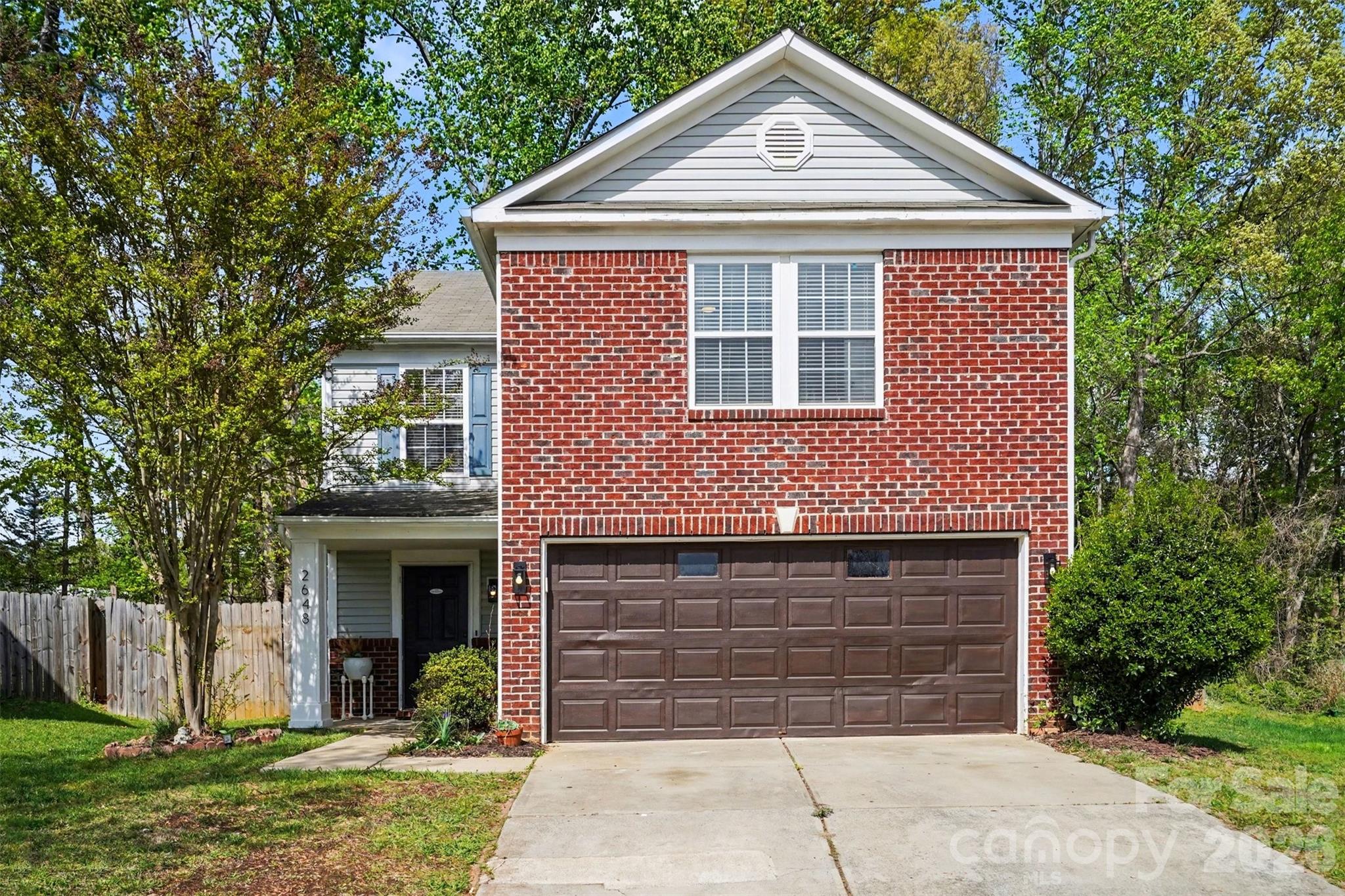 Welcome to this beautifully maintained two-story home in the desirable Meadowhill community, where comfort, space, and style come together effortlessly. The classic brick-accented exterior and inviting front porch create a warm first impression, while the spacious driveway and attached garage add everyday convenience.

Inside, the home opens to a bright and airy layout filled with natural light and updated finishes. The main living area offers a seamless flow, featuring modern flooring and a generous living space that easily accommodates both relaxing and entertaining. Just beyond, the kitchen stands out with its clean design, abundant cabinetry, and a layout that connects naturally to the dining area, making gatherings feel effortless.

Upstairs, the home continues to impress with well-proportioned bedrooms and a versatile loft space that can adapt to your needs, whether as a secondary living area, home office, or playroom. The primary suite provides a comfortable retreat with plenty of room to unwind, while additional bedrooms offer flexibility and charm.

Step outside to a fully fenced backyard designed for both privacy and enjoyment. The open yard offers plenty of space to spread out, complete with a patio and fire pit area that’s perfect for evenings outdoors or hosting friends. Backing up to a tree-lined area, the setting feels peaceful while still being part of an established neighborhood.

With its thoughtful layout, inviting outdoor space, and convenient location near neighborhood amenities like a playground and walking areas, this home offers a lifestyle that’s both comfortable and connected.