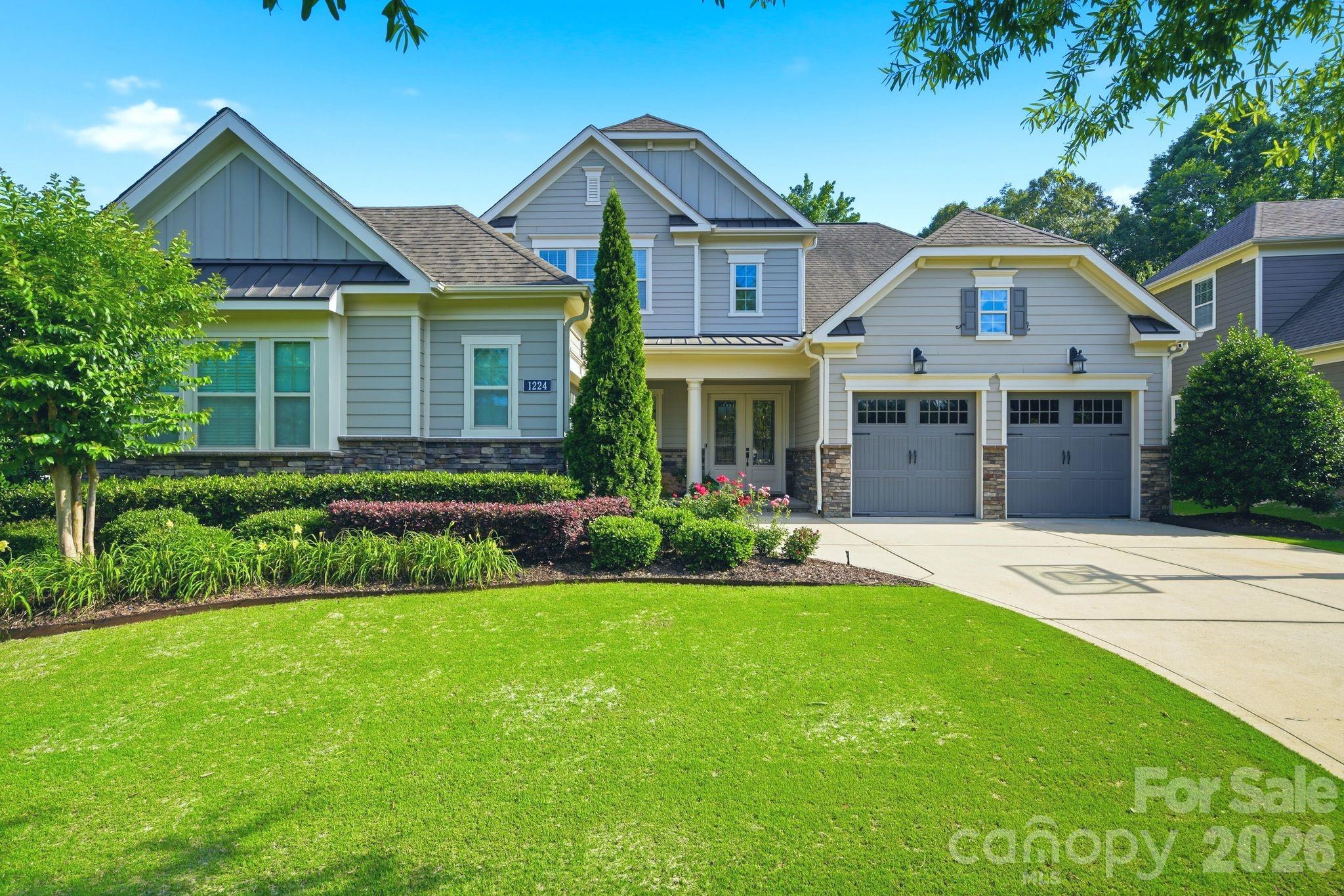Luxury should feel effortless—and this home delivers. Perfectly positioned on the 14th tee box of Springfield Golf Club, this  5-bedroom, 4.5-bath showpiece combines elevated design with the kind of warmth that makes you want to stay awhile.

The main-level primary suite offers a private retreat, while every room is filled with custom details, designer finishes, and thoughtful upgrades that set this home apart. Added bonus is a guest suite on main and 2 home offices. Entertain with ease, spread out in spacious living areas, and enjoy the convenience of a 3-car garage plus walk-in attic storage that keeps everything tucked away.

Then there’s the view. Imagine evening "wine" downs on the screened in porch, and weekends spent enjoying all that Springfield has to offer—from championship golf and resort-style pools to tennis, pickleball, walking trails, and a true sense of community.

Homes like this don’t just make an impression—they make you rethink what “home” should feel like.
