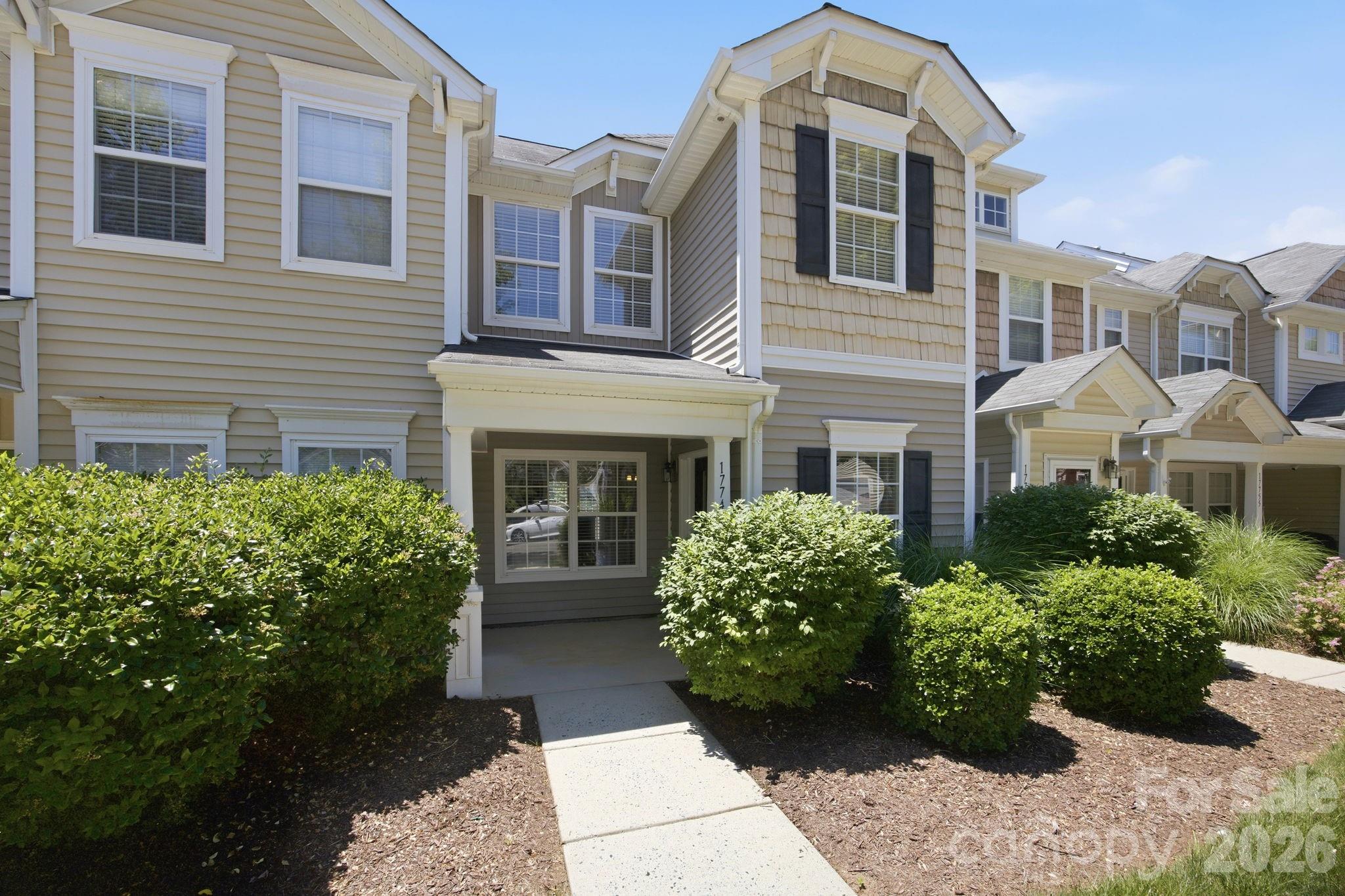 Spotless and move-in ready townhome with fresh paint, brand new wide plank LVP on the main level, and new carpet on the second floor.  Fridge, washer, dryer remain.  Bright interior.  Two primary suites on the second floor and laundry on the second floor, too.  Popular neighborhood with community green space, parks, a pool with a slide, and a playground.  Excellent Huntersville location with neighborhood access to miles of greenway trails (at Caldwell Track Drive), a short walk to North Meck Rec Center, and just a few minutes' drive to groceries, stores, and restaurants.  Sought-after Hough High School zone.  Perfect home for you, offering a low-maintenance lifestyle, or excellent rental potential due to schools and location.  Can accommodate a quick closing.