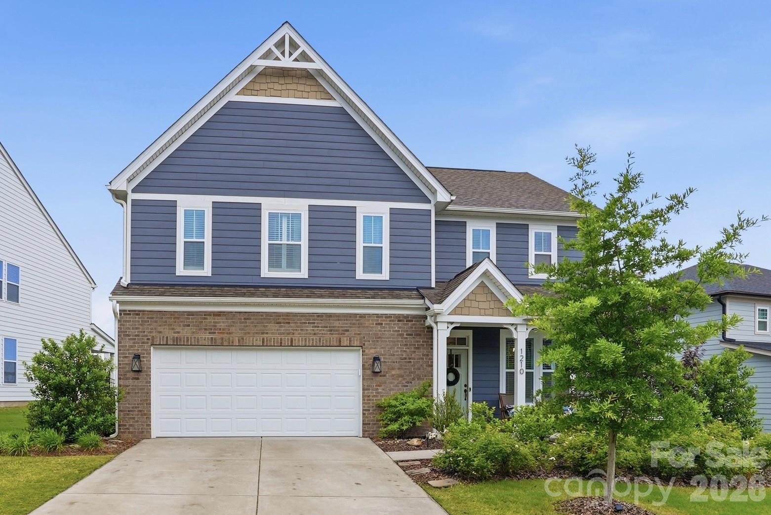 Step into a home that captures the essence of one of the Carolinas’ most sought-after communities, Mason’s Bend, where effortless living meet along the scenic banks of the Catawba River.

Your story begins on a welcoming front porch lined with classic rocking chairs, an ideal setting for slow mornings and relaxed evenings. Inside, LVP flooring guides you through a beautifully curated main level. The dining room, highlighted by a tray ceiling and designer accent wall, creates an inviting backdrop for both intimate dinners and larger gatherings.

At the center of it all, the kitchen is as functional as it is refined, featuring quartz countertops and a seamless connection to the great room. Here, a gas fireplace and views of the backyard create a space that feels both warm and elevated.

Step outside to a private outdoor retreat designed for both relaxation and entertaining, complete with an expanded patio, pergola, stone fire pit, and a generously sized fenced yard large enough for a pool.

Upstairs, the primary suite offers a serene escape with a tray ceiling and a spa-inspired bath featuring a walk-in shower with floor-to-ceiling tile, quartz countertops, and a custom closet. A spacious loft provides flexibility for a home office, media room, or additional living space.

What truly distinguishes this property is its setting within Mason’s Bend, one of the area’s most desirable communities. Residents enjoy resort-style amenities including a pool, fitness center, walking trails, and direct access to the Catawba River for kayaking or simply taking in the natural beauty. With an on-site elementary school and a strong sense of connection throughout the neighborhood, this is more than a place to live, it’s a lifestyle.