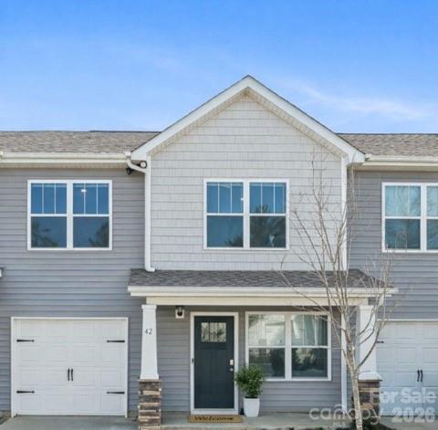 Welcome to easy living focused on convenience and low maintenance. This well-appointed 3-bedroom, 2.5-bath home offers comfortable, functional space.

Enjoy a bright kitchen with abundant natural light and sliding glass doors opening to a small patio, plus a dedicated dining area. Just off the kitchen is an indoor laundry room with a convenient half bath.

The main level features a nice-sized living room and a welcoming covered front porch. Upstairs are all three bedrooms and two full bathrooms.

Additional highlights include a single-car garage and low-maintenance living, all close to shopping, dining, and an easy commute.

Call today for your personal viewing.