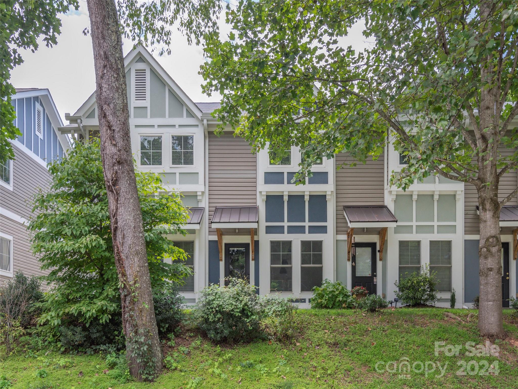 Well maintained townhome, 2 bedrooms, 1.5 baths, in convenient Woodfin location, easy access to I-26, Weaverville and downtown Asheville; upgrades include a new heat pump installed in 2021, laminate floors and light fixtures; tile floor in the full bath; kitchen, living room and powder room on main level, two bedrooms, full bath and laundry closet on second level, two designated parking spaces; cats and dogs allowed with some restrictions; nine units in subdivision with a rental cap of two; low HOA dues paid monthly.