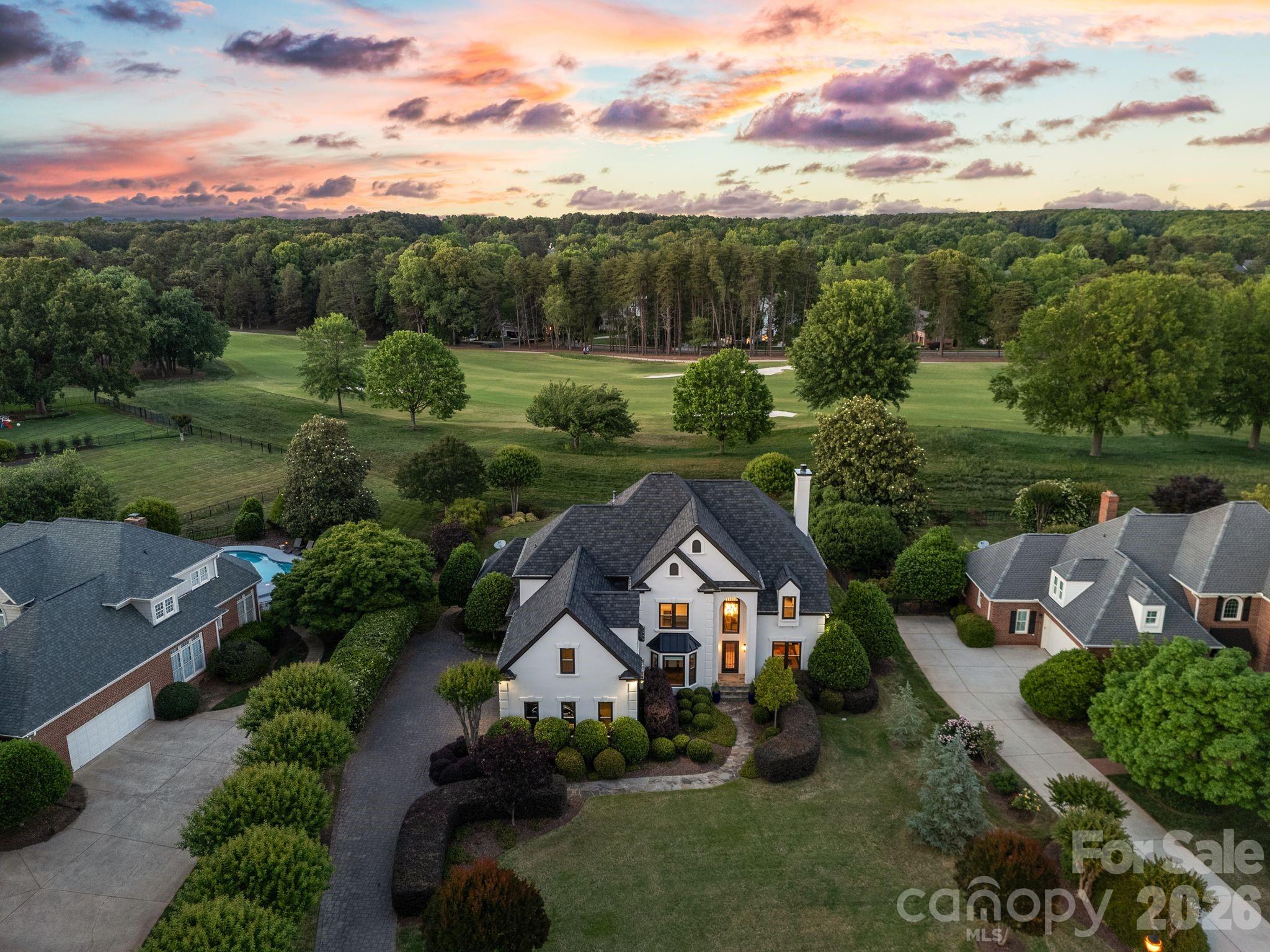 This is not just a home; it's a lifestyle. 4,100 square feet of masterfully renovated luxury, with golf course views from almost every room and is just steps away from the prestigious Peninsula Club.  *** THE GOLDEN TICKET: The sellers are offering the rights to their Full Golf Membership at the Peninsula Club. In a market where memberships are in ultra high demand, this is your "fast track" to the club lifestyle. Upon membership approval and payment of initiation fees, you can bypass the waitlist and begin enjoying the championship course, tennis, and club amenities immediately!

The heart of the home features a stunning great room with soaring vaulted ceilings and a sophisticated built-in bar with a wine cooler—the ideal setting for hosting guests. The gourmet kitchen is a study in high-end design, equipped with a professional-grade Wolf range, Sub-Zero refrigeration, and dual dishwashers. Experience the beauty of the Carolinas from the oversized screened porch, accessible from both the great room and the kitchen... this outdoor sanctuary offers tranquil fairway views, providing a front-row seat to the manicured greens of The Peninsula. 

Main floor Primary Suite, 3 additional upstairs bedrooms, along with an airy loft and an oversized Bonus Room. There is an abundance of storage throughout, including a large walkup attic for future expansion and/or storage. 3 car garage leaves additional room for golf cart or a 3rd car. 

This home has preliminary Pool approval from the HOA and is Impervious Exempt.