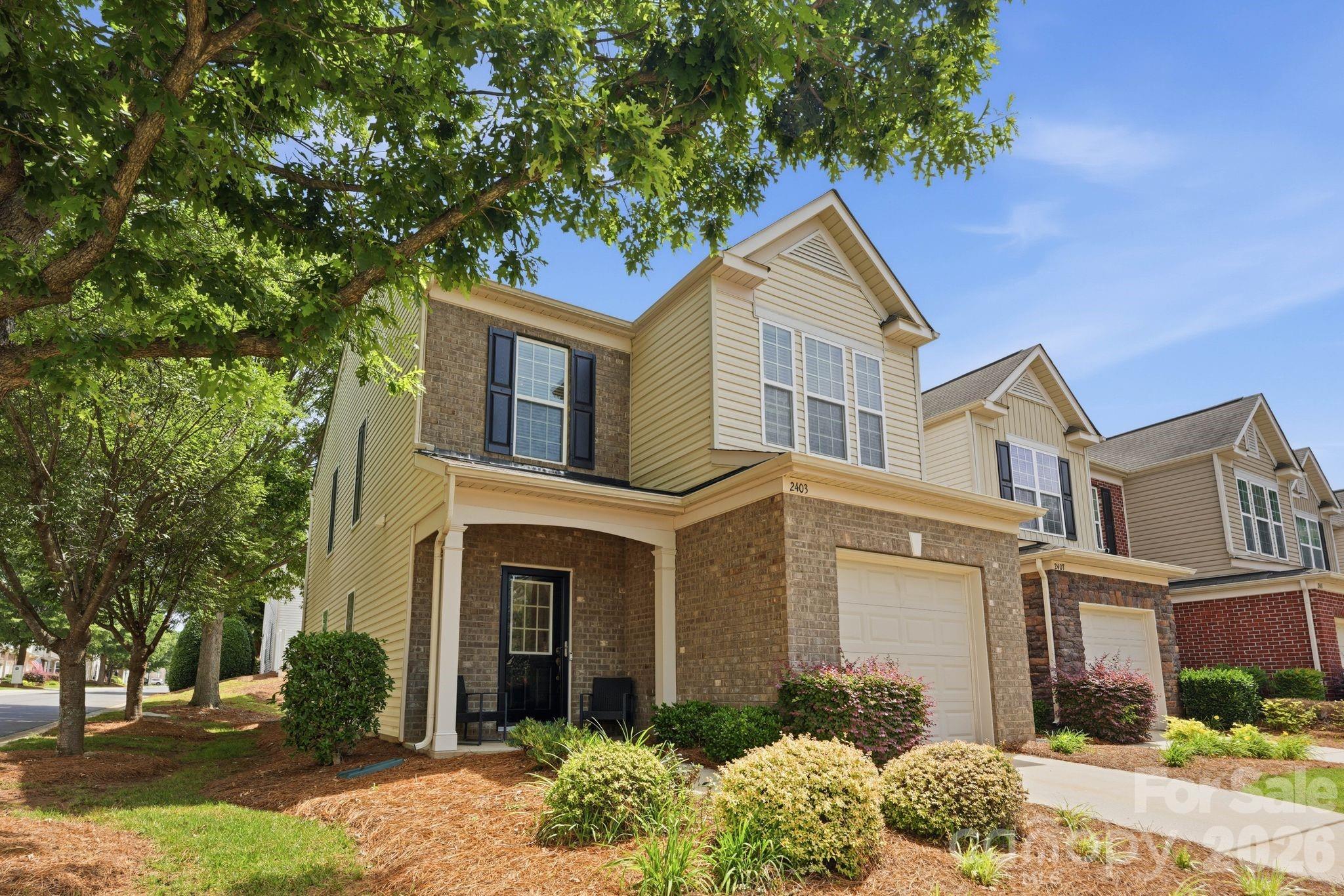 Wonderful end unit townhome located in private, gated Park South Station community! Three bedroom and 2.5 half bath home. Charming foyer flows into the bright open living, dining room and kitchen space. Eat in island, granite counters, and stainless appliances. Half bath on main. Upper level includes spacious primary suite with tray ceiling and private bath. Primary bath with standing shower and dual vanity. Two additional bedrooms and full bath. Private patio with mature hedges. Community Amenities include outdoor pool, playground, fitness center and much more! Conveniently located in the heart of Southpark. One car attached garage with storage system.