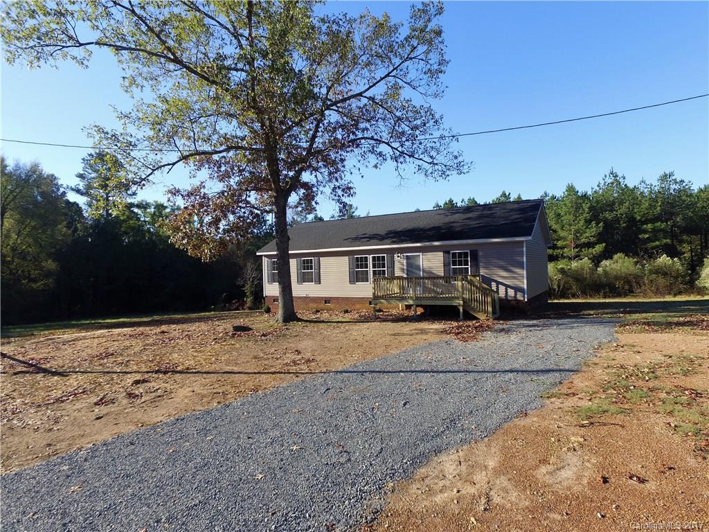 Gorgeous home sitting on over 4 acres of land in the country. New HVAC system, flooring, paint, back and front porch and new appliances. Great floor plan! All bedrooms have big closets. Kitchen is awesome! Pictures tell the story. Schedule an appointment to see this great property!