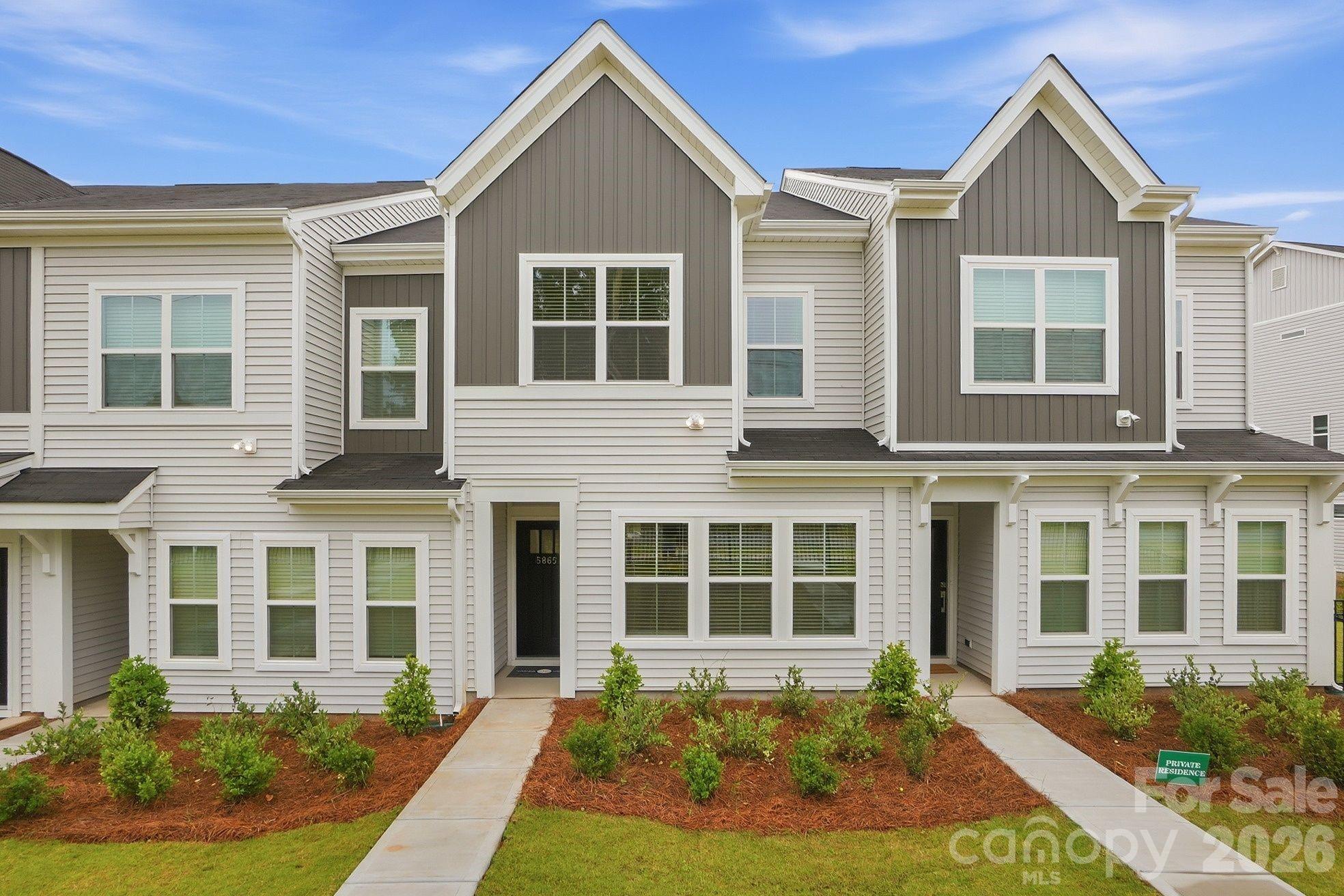 Built by Mungo Homes, this new construction townhome at Sloan Station offers 3 bedrooms, 2.5 bathrooms, an open-concept main level, and a spacious one-car garage. Designed for comfort and convenience, this home gives buyers the feel of single-family living with the ease of low-maintenance townhome ownership.

The main level features 9-foot ceilings, recessed lighting, luxury vinyl plank flooring, a pantry, mud room, and practical storage. The great room flows into the kitchen and eat-in dining area, creating an easy layout for daily living and entertaining. The kitchen includes a spacious island, quartz countertops, tile backsplash, pendant lighting, ample cabinet space, and luxury designer finishes. A powder room near the garage entry adds everyday convenience.

Upstairs, the primary suite features tray ceilings, a walk-in closet, double vanity sinks, quartz bathroom countertops, and a tiled shower. Two additional bedrooms, a full bathroom, and an upstairs laundry closet complete the second floor.

Sloan Station offers quick access to Uptown Charlotte, I-85, Charlotte Douglas International Airport, South End, Wesley Heights, FreeMoreWest, the West Morehead corridor, the U.S. National Whitewater Center, Charlotte Regional Farmers Market, dining, recreation, and major employment centers. Additional features include HOA-maintained exterior upkeep, a community dog park, a 2-10 structural warranty, and 30-day and 11-month builder checkups.