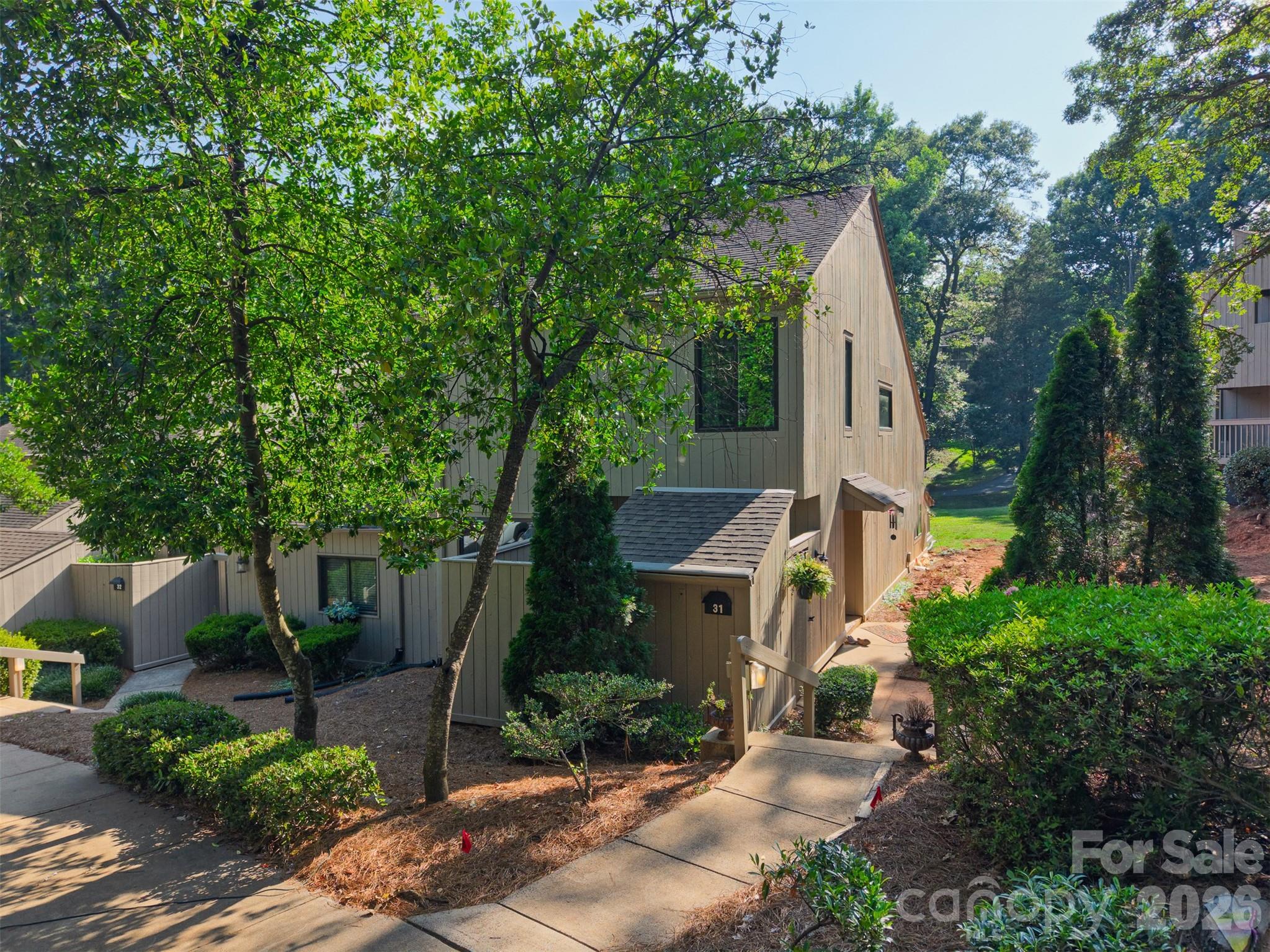 Welcome home to this beautifully updated end unit in the heart of River Hills. This immaculate four-bedroom property lives like brand-new construction, offering modern upgrades, soaring ceilings, and an open-concept layout that makes everyday living feel like a vacation.

The oversized kitchen island is a cook’s dream, complemented by all-new appliances and generous prep space. A versatile flex room — perfect as an office, sunroom, or cozy retreat — flows seamlessly to the brand-new deck, giving you the ideal spot to enjoy those wonderful seasonal days.

Upstairs, you’ll find an oversized primary suite with a spacious ensuite bath and the convenience of laundry located directly inside the primary closet — making laundry days effortless. Two additional bedrooms are also located upstairs, including one with a charming cut-out nook that’s perfect for extra storage or a sweet reading corner.

The fourth bedroom is thoughtfully situated on the main floor, ideal for guests, with a half bath conveniently located just across the hall.

As a Bluff Villas owner, you’ll enjoy exclusive access to a private community pool just around the corner. River Hills also offers miles of scenic walking paths, its own marina, and a vibrant country club — creating a lifestyle that blends relaxation, recreation, and convenience.

With thoughtful updates throughout and amenities at every turn, all you need to do is unpack and start enjoying the River Hills experience.