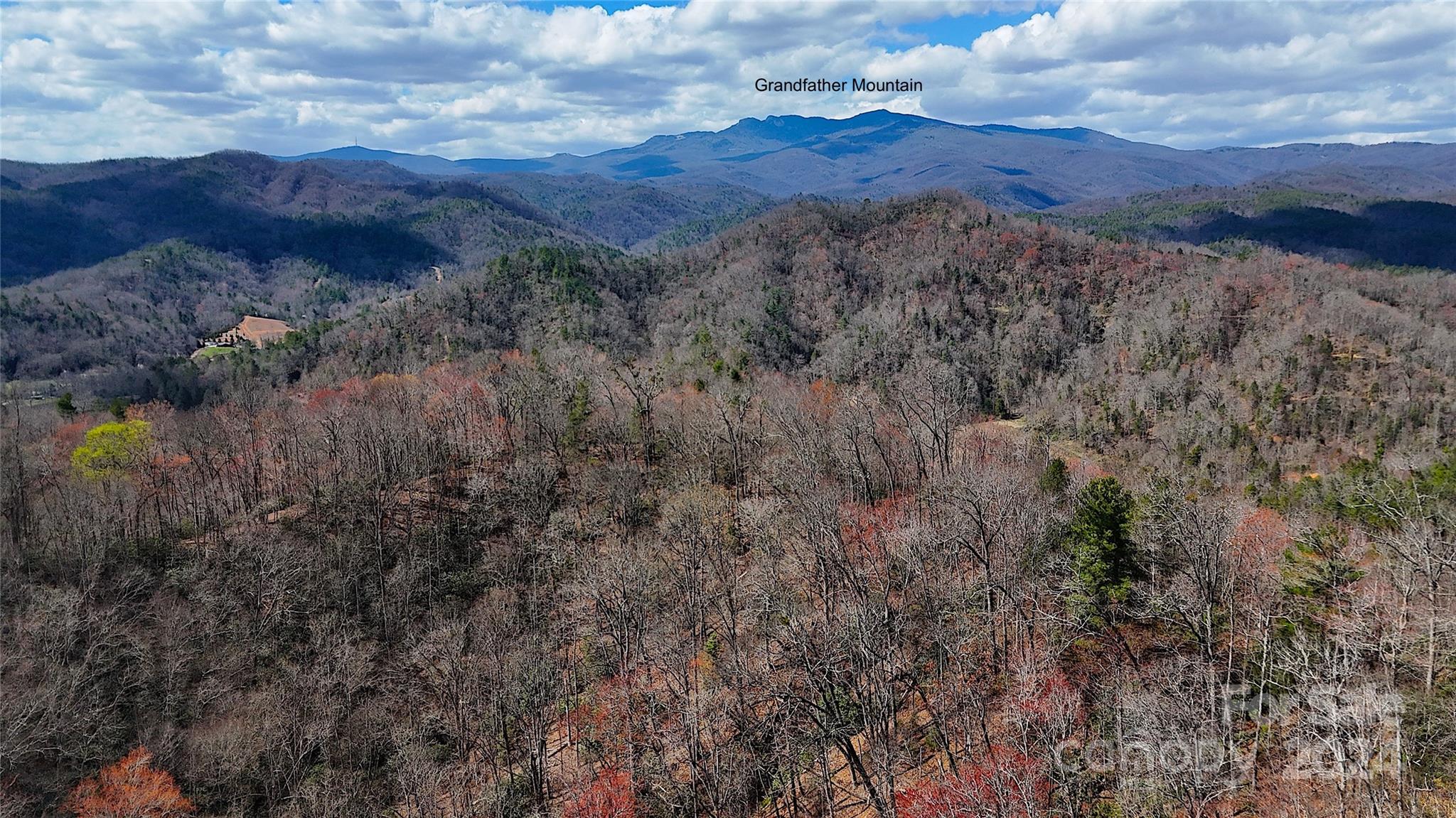 This 815 +/- acre property in Caldwell County offers a serene mountain escape just 6 miles south of Blowing Rock, North Carolina. Surrounded by mature trees, streams, and scenic walks along rhododendron, it’s perfect for nature lovers. Sharing boundary with 4.5 miles of adjacent Pisgah National Forest, outdoor recreation opportunities are plentiful. The land is currently under forest management, providing an annual reduction in county land taxes. For access details, please contact the listing broker.