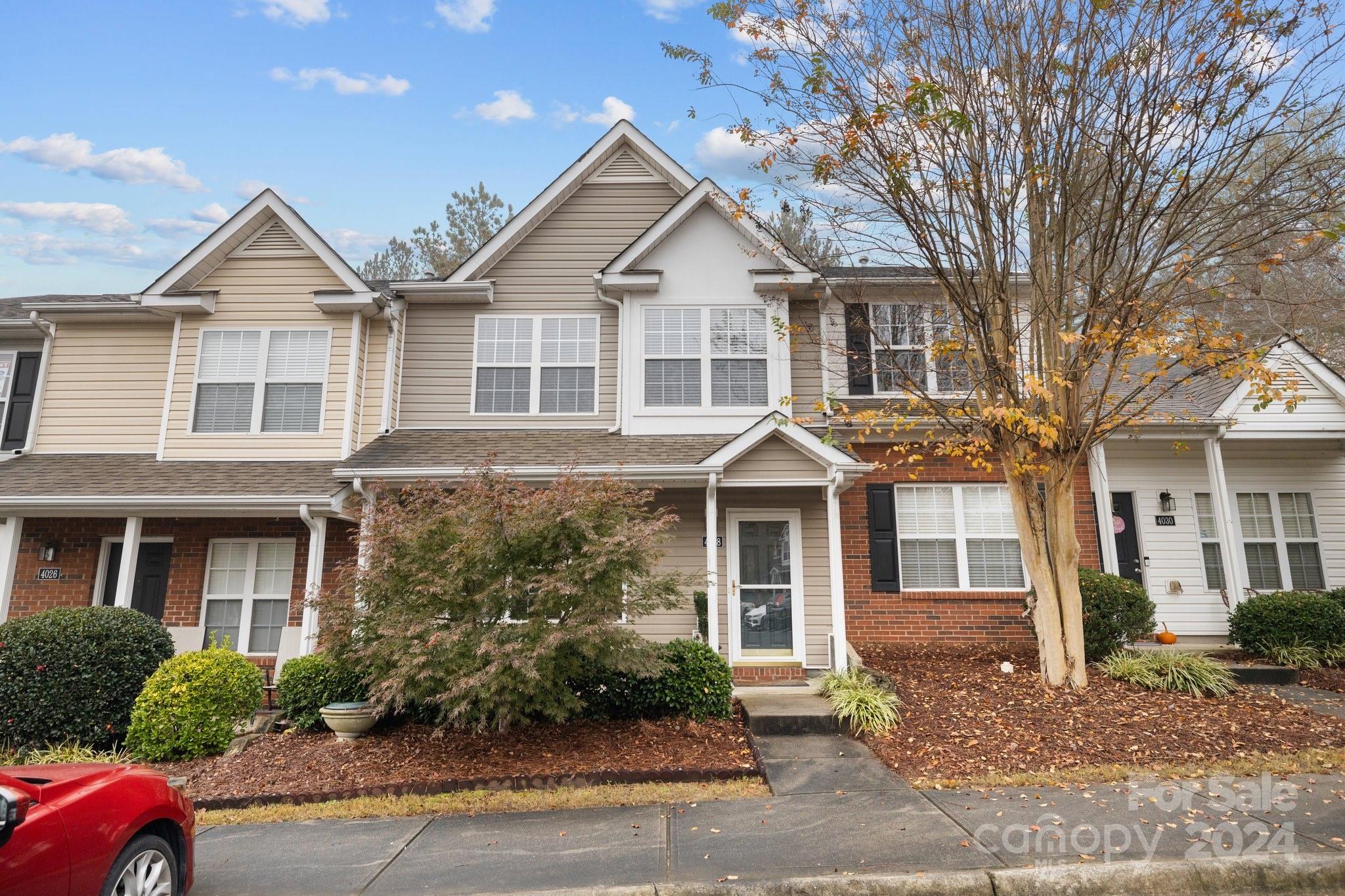 Much sought after Windsor Trace three bedroom, two and a half bath town home.  Large family room / dining area, kitchen featuring island, plenty of cabinet space and laundry room. Kitchen leads to a privately situated outdoor patio. Conveniently located at the front of the neighborhood (for easy ingress / egress) and just across from the pool. Accessible to one of the fastest growing areas anywhere (including MUSC Medical Center breaking ground adjacent to Windsor Trace) in 2025.  Recreational facilities, restaurants, professional services and other shopping opportunities nearby while only minutes from Uptown Charlotte.