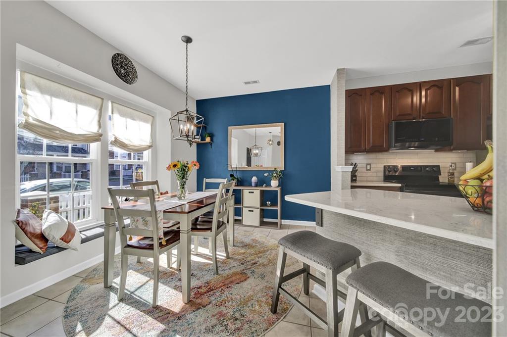 Come see this move-in ready town home in highly sought after Manchester Village- conveniently located close to everything: shopping, dining, and minutes away from Oldtown Rock Hill and I-77.

The kitchen boasts new quartz countertops with peninsula, great for entertaining!  Enjoy upgraded cabinets with pull out shelves, new top of the line black stainless steel appliances, and tile backsplash.  

The upstairs features a large primary bedroom with a tray ceiling, large closet and beautiful bathroom with jetted tub and large second bedroom and full bath.  The HVAC and water heater were replaced in 2019. 

Don't forget to check out the beautiful, low maintenance backyard facing a green area and mature trees.  HOA fees include all exterior and common area maintenance, roof maintenance and replacement, and community pool maintenance and access.