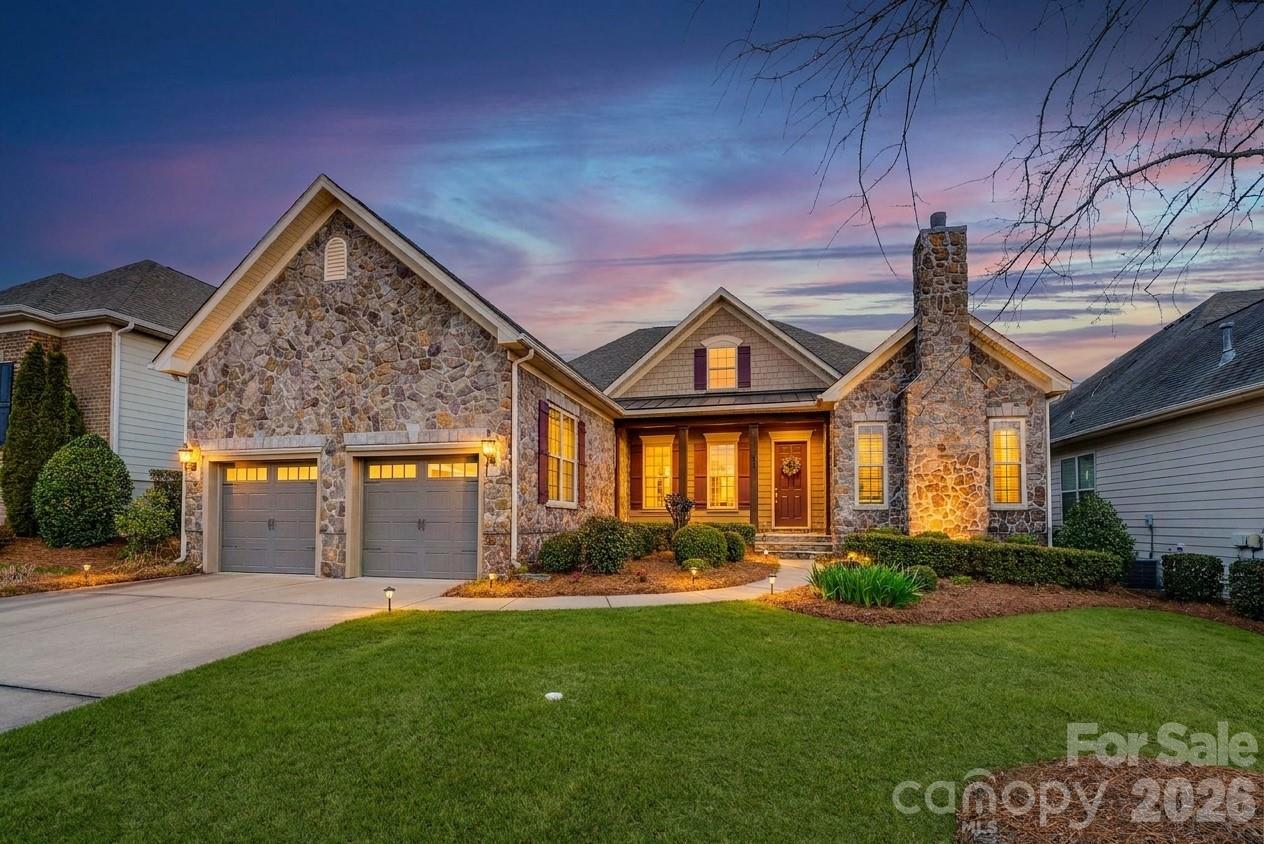 PRICE IMPROVED! Experience the perfect blend of sophisticated design and effortless living in this meticulously maintained home at 14920 High Bluff Court. 
Tucked away in the highly sought-after Regency at Palisades, this rare, single-level floor plan is a dream for those who value an open-concept flow and high-end architectural details. The heart of the home is a chef-inspired kitchen featuring a massive island and premium cabinetry, flowing seamlessly into a light-filled living area designed for both grand entertaining and quiet relaxation. You’ll find unique, upscale touches throughout, including a dual fireplace that warms both the family room and the private executive study—a feature that truly sets this property apart. 
High tray ceilings, integrated surround sound, and pristine floors create an atmosphere that feels both natural and timeless. Step outside to discover a lifestyle of pure relaxation where the lawn maintenance is handled for you. Enjoy your morning coffee on the private porch or host friends on the back patio overlooking a beautifully landscaped, level backyard. 
Living here means more than just owning a beautiful home; it means having exclusive access to resort-style amenities including pools, fitness centers, pickleball courts, and the nearby shores of Lake Wylie. This is an invitation to spend more time enjoying life and less time on chores. Don't just dream the lifestyle—live it. Message us today for your private showing.