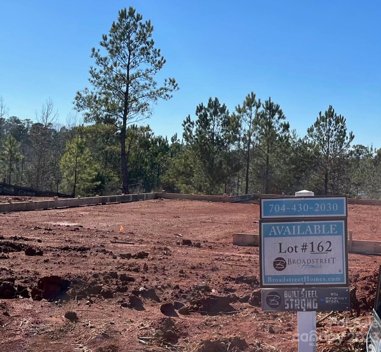Wonderful spot in Edgewater to build your dream home, with seasonal view.  Seller has already graded and padded this homesite - saving the buyer approximately $20,000! Whether you're searching for a primary home or a weekend/2nd home getaway - you'll feel like you're always on vacation in this amenity-rich community! Fishing Creek Lake is nature's paradise for boating, fishing, bird & wildlife watching.  Edgewater offers residents walking trails, a beautiful waterfront pavilion, outdoor pool, and tennis as part of the HOA fee.  If golf is your game, or you have a boat to store, contact the Edgewater Golf Club/Marina for information on membership & fees - while not mandatory, these amenities are available to residents who wish to belong.  Note that a new build is subject to architectural review and approval, and adherence to square footage requirements.  Seller will entertain a bulk purchase with Lot 353 in the community.  Don't miss this wonderful lakeside community!