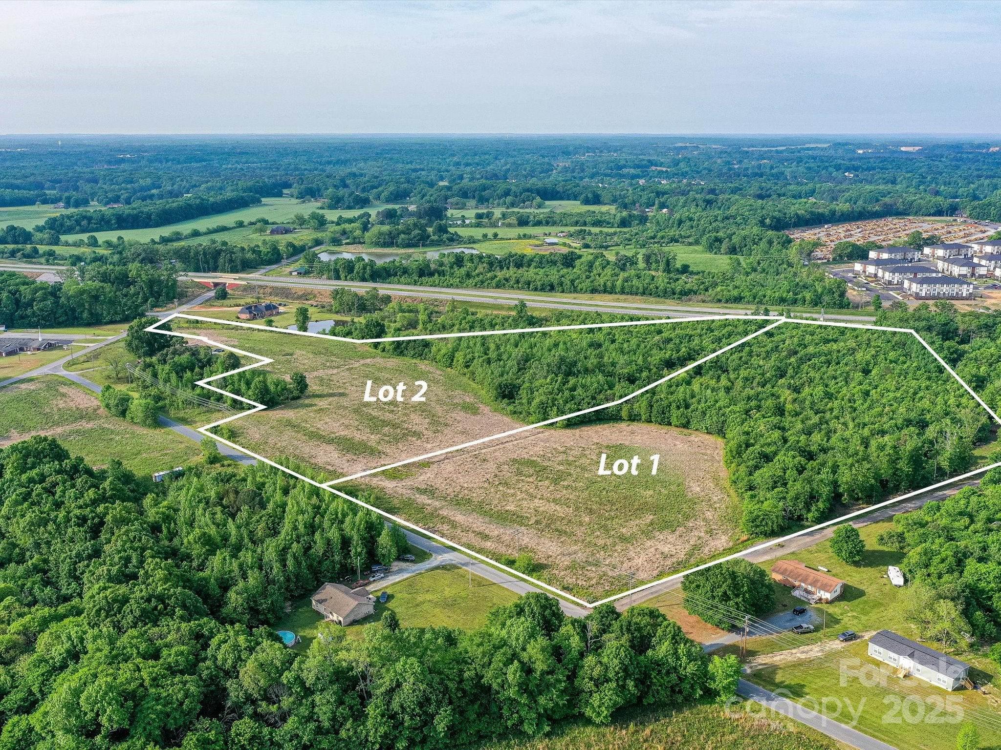 Prime Time Location.  Winchester Road Tract 2.  12 acres ideally situated between Monroe, Indian Trail, Unionville and Hemby Bridge.  Open land in the front and woods in the rear.  NO HOA, NO Restrictions.  Site has a Soil Report from a Licensed Soil Scientist.  Union County Improvement Permit for a shallow placement conventional system.  There is also a report from soil scientist that dictates a design for a 3 bedroom primary and 1 bedroom Additional Dwelling Unit.   Easy commute to and from Charlotte.  Driveway access can be constructed off of either Winchester Road or Willis Long Road.  Phenomenal opporturnity for an equestrian tract or just some elbow room and privacy for those desiring to get out of a cramped subdivision, all the while remaining very close to dining, shopping, medical facilities, schools and public parks.  Subject to an easement for water line to benefit Tract 1.