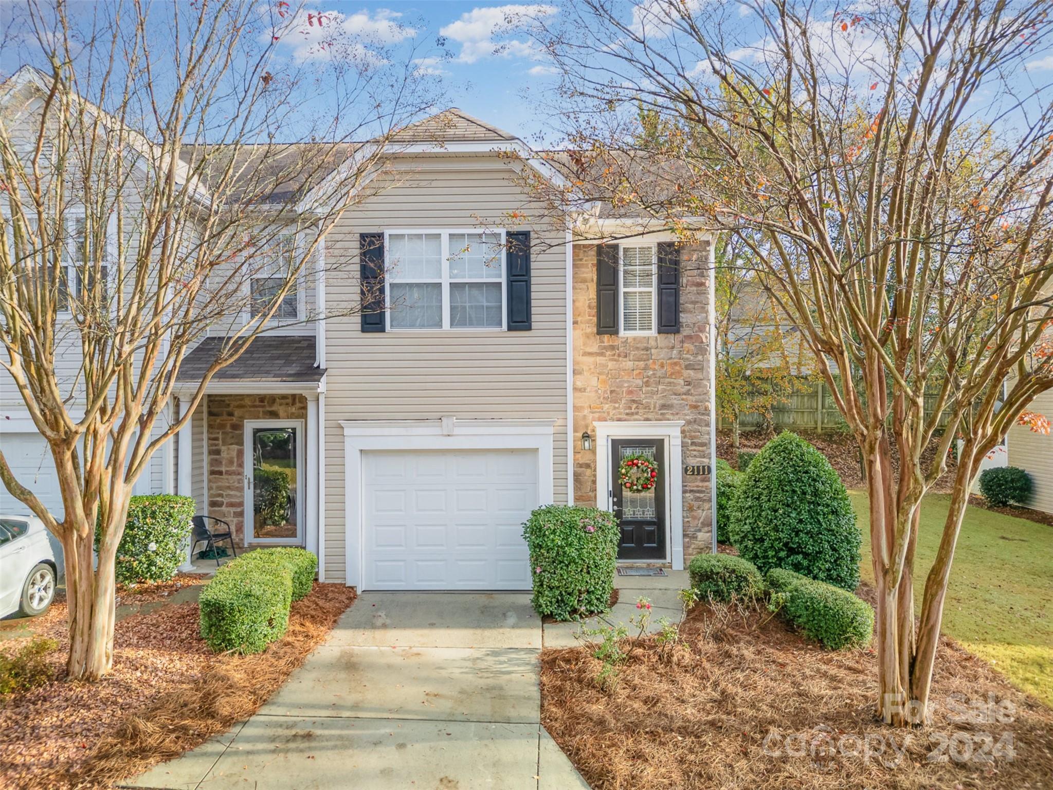 Charming 3-Bedroom, 2.5-Bath Townhome in the Desirable Waterstone Community. This bright and welcoming end-unit townhome offers a fantastic living experience with fresh updates and plenty of space. The home has been professionally deep cleaned and features new paint throughout most areas, new carpet and LVP flooring throughout the home. Enjoy an open-concept living area with a cozy fireplace, perfect for entertaining or relaxing. This white chef's kitchen has stainless steel appliances, beautiful granite countertops, and ample cabinet space for all your storage needs. Upstairs, the spacious primary bedroom features vaulted ceilings, creating an airy and relaxing retreat. 2 additional bedrooms provide plenty of room for family or guests. Step outside to your private deck and patio area, offering a peaceful space to unwind. Amenities, include a community pool, playground, and picnic area. Conveniently located-minutes from I-77, shopping, dining, schools, and trails.