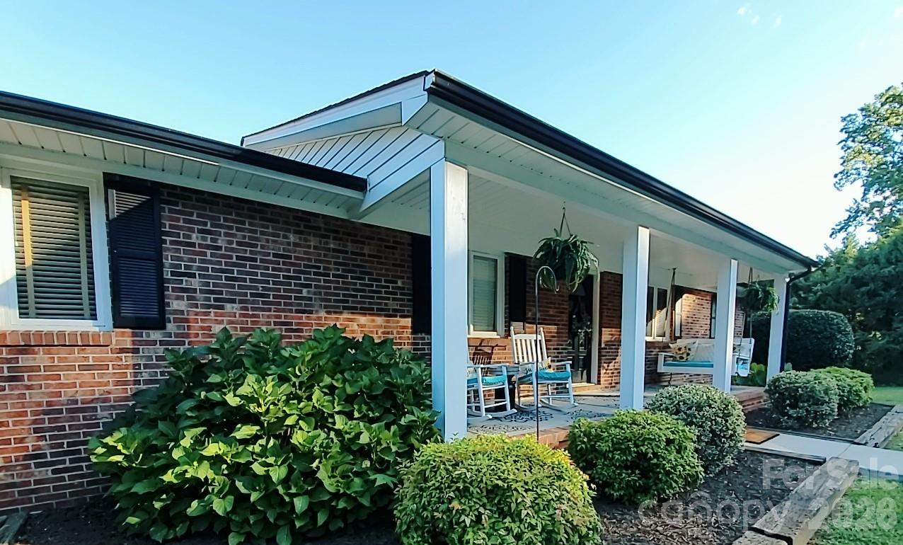 Don’t miss out on the opportunity to own this beautifully updated brick ranch, featuring 3 bedrooms and 2 baths upstairs and 1 Bonus (currently used as a bedroom) and half bath downstairs, situated on nearly 2.5 acres in Mt. Holly. This remarkable property boasts a stunningly updated kitchen complete with a wall oven and gas cook-top, two inviting propane-fueled fireplaces, a freshly painted, spacious deck, and an attached two-car garage in addition to a separate three-car garage/workshop. This move-in-ready residence includes updated bathrooms, new flooring, and fresh paint throughout. The kitchen cook-top and both fireplaces are fueled by a 100-gallon propane tank. Take a moment to relax on the lower patio, which offers ample privacy—ideal for enjoying the hot tub or spending an evening around the fire pit, all while surrounded by nature and mature trees in this beautifully landscaped yard. This charming home is perfect for those seeking both comfort and functionality, offering plenty of space for family gatherings or entertaining guests. The open floor plan allows for easy flow between rooms, making it a delight to host parties or enjoy cozy evenings at home. For hobbyists or car enthusiasts, the additional three-car garage/workshop provides ample space for projects and storage. Please note that while the basement bedroom is recorded as the fourth bedroom in tax records, it does not have a closet or window. Septic permit is for three bedrooms. The hot tub will be sold "as is" without any warranty.