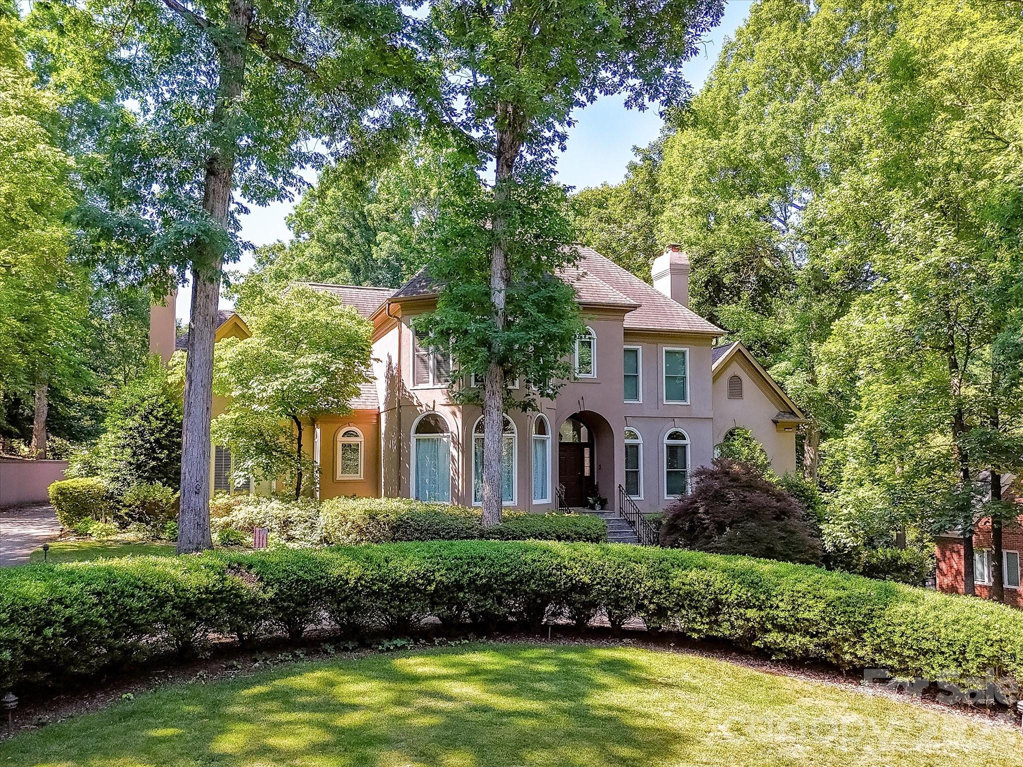 Remodeled, Custom Home overlooks the 16th green at Piper Glen Country Club! Gorgeous, Dramatic & Elegant throughout with amazing custom touches and finishes. Inviting entry with instant, fabulous views of the Golf Course via 4 panel Pella Impervia sliding doors. Large Office with bay window for great natural light. Great Room offers soaring ceilings & a gas fireplace. Completely updated Chef's Kitchen features quartz counters, high end stainless steel appliances including a Monogram induction oven, huge island with plentiful seating, walk in pantry & a quartz doggie station. Eat in Kitchen with huge windows for great views. Formal Dining/Keeping Room off Kitchen with custom built ins and & 2nd gas fireplace. Dual staircases for convenience. The luxurious primary suite serves as a private retreat with vaulted ceilings, oversized windows, and a spa-inspired bath complete with dual vanities, a soaking tub, and a large walk-in shower. Travel to the upper level where you will find a huge Bedroom with ensuite, 2 additional bedrooms & a spacious bonus room. There is attic storage as well for tons of storage. Step outside to enjoy exceptional outdoor living with an expansive patio designed for entertaining, dining, panoramic golf course views and relaxing while overlooking the private, tree-lined backyard. The large yard offers plenty of space to enjoy the outdoors while maintaining a peaceful sense of seclusion. A circular driveway completes this magnificent home. Ideally located near TPC Piper Glen Country Club and championship golf, this home also offers convenient access to Ballantyne, The Bowl at Ballantyne, Stonecrest Shopping Center, premier dining, shopping, entertainment, and major commuter routes. Combining timeless elegance, modern updates, and an unbeatable location, this remarkable home presents a rare opportunity in one of Charlotte’s most sought-after neighborhoods.