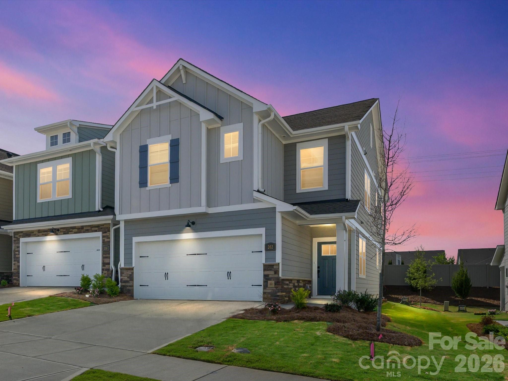 END TOWNHOME. Discover the ease of luxury low-maintenance living in this brand-new Mecklenburg II townhome, conveniently located just minutes from Ballantyne, Waverly, and the charming shops and restaurants of historic downtown Waxhaw. Filled with natural light, the open-concept living area is highlighted by three large picture windows overlooking a private wooded backyard. The designer kitchen features 42” White colored soft-close cabinetry, sleek quartz countertops, a spacious shiplap wrapped island open to the family room, Frigidaire stainless steel appliances, an exterior-vented range hood, and a pantry with solid shelving. The main level showcases durable LVP flooring throughout, along with composite stair treads leading to the second floor. Upstairs there is a loft area with LVP flooring, unwind in the luxurious Owner’s Retreat featuring a tray ceiling, oversized walk-in closet, and three large windows that create a bright, airy feel. The spa-inspired primary bath offers tiled flooring, a large tiled walk-in shower with bench seating, oversized dual vanity with quartz countertops and soft-close cabinetry, a linen closet, and a private water closet. The second floor also includes two spacious secondary bedrooms, a full hall bath, and a thoughtfully designed laundry room with tiled flooring and a convenient folding table. Enjoy peaceful mornings or relaxing evenings on the covered porch overlooking the private backyard. A side-by-side two-car garage and full driveway provide ample parking for both homeowners and guests. With low taxes, low-maintenance living, and the feel of a single-family home, this townhome offers the perfect blend of comfort, convenience, and style. Ask about special low-interest rate opportunities!