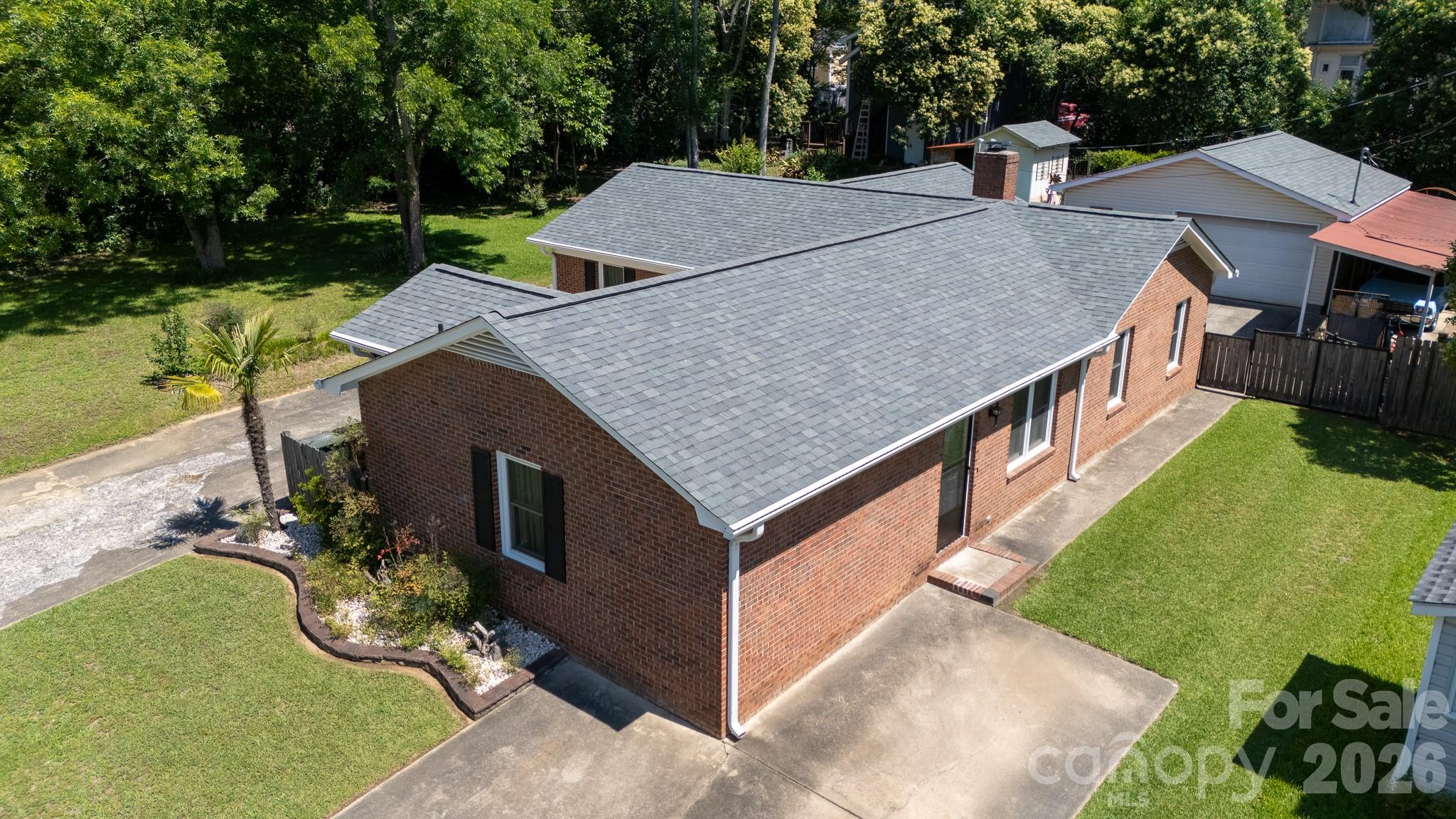 This beautifully maintained duplex is move-in and rental ready, offering endless possibilities for investors, business owners, or those seeking a live/work setup. Featuring two separate entrances and two dedicated parking pads, the property can be used as a traditional duplex, income-producing rental, office space with living quarters, or a combination of both.
Each unit offers 2 bedrooms and 1 full bathroom! Unit “A” offers a large living area with vaulted ceilings and dining area, breakfast bar, kitchen with washer/dryer hookup. Unit “B” offers large living area with vaulted ceilings, built-ins and wood burning fireplace. Updated kitchen with beautiful cabinets, granite countertops, dining area, breakfast bar and laundry room. Each unit has plenty of storage space! 
This property offers a spacious, private, fully fenced backyard designed for both work and relaxation. Enjoy a large courtyard style backyard with concrete patio area, a covered patio perfect for entertaining, and an attached storage room for added convenience.
A standout feature is the 24' x 26' insulated workshop/garage with 12ft garage door,  making it ideal for vehicles, equipment, hobbies, or a home business. The workshop is wired, insulated, and equipped with heat for year-round use. It also includes pegboard walls, select cabinetry, and select overhead storage that will remain with the property.
 Located within walking distance of downtown and the Fountain, you'll have easy access to local shops, restaurants, events, and community attractions.
A rare opportunity to own a versatile property in a highly desirable location! Schedule your showing today.