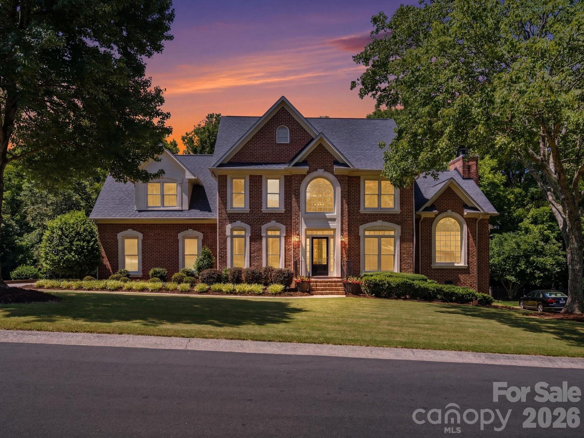 This is IT! Exceptional curb appeal welcomes you home with enhanced professional landscaping and timeless full-brick construction in the highly sought-after Rea Woods community. This beautifully updated John Wieland home offers 4 bedrooms, 3.5 baths, and an inviting floor plan designed for both everyday living and entertaining.

Step inside to a dramatic two-story foyer and a private office with French doors, formal dining room, updated powder room.  The stunning kitchen is equipped with a center island, upgraded stainless steel appliances, gas cooktop with downdraft vent, wall oven with combo microwave/convection oven, walk-in pantry, breakfast area, and a convenient pocket office. The adjacent great room features a gas fireplace, custom built-ins, and abundant natural light. 

The main level offers convenient laundry room with adjacent drop zone near the garage entry.

Retreat upstairs to the peaceful owner's suite showcasing a beautifully remodeled spa-inspired bath with new countertops, flooring, tilework, freestanding soaking tub, mirrors, and fixtures. Two large walk-in closets and a versatile flex room provide the perfect space for a nursery, home office, hobby or fitness space. Three additional secondary bedrooms, with one of them includes an ensuite bath.

Additional recent improvements include a newer roof (2020), upstairs HVAC (2021), gas water heater (2021), upgraded millwork, hardware, lighting, added gutters, and landscape lighting.

Outdoor living with an expansive rear deck overlooking the large, level backyard. An oversized 2-car garage with storage room completes the package.

Ideally located in South Charlotte, Rea Woods offers unparalleled convenience to premier shopping, dining, and entertainment, with easy access to SouthPark, Ballantyne, Uptown Charlotte, I-485, and Charlotte Douglas International Airport. A truly move-in-ready home in one of Charlotte's most desirable locations! HURRY!