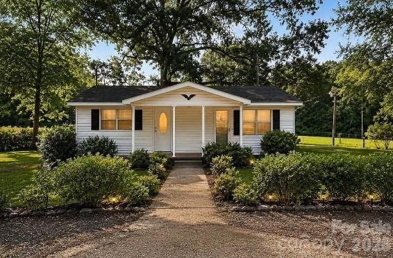 Welcome to this charming, move-in ready 3-bedroom, 1-bath cottage situated on a beautiful 1-acre lot in Pageland, SC! Offering the perfect blend of country charm and modern updates, this property provides plenty of room to relax, entertain, garden, or simply enjoy the peaceful surroundings.

Inside, you'll find a warm and inviting living space with numerous recent improvements, including a **new roof (2026), new flooring (2025), and all-new plumbing (2025)**, giving buyers added peace of mind. Outside, the detached outbuilding features **new siding (2026)** and offers excellent space for storage, a workshop, or hobbies.

Whether you're a first-time homebuyer, looking to downsize, or searching for a quiet country retreat with room to spread out, this property checks all the boxes. Conveniently located just minutes from the amenities of Pageland while offering the privacy of a spacious 1-acre homesite, this home is ready for its next owner.

Don't miss your opportunity to own this updated country cottage—schedule your private showing today!