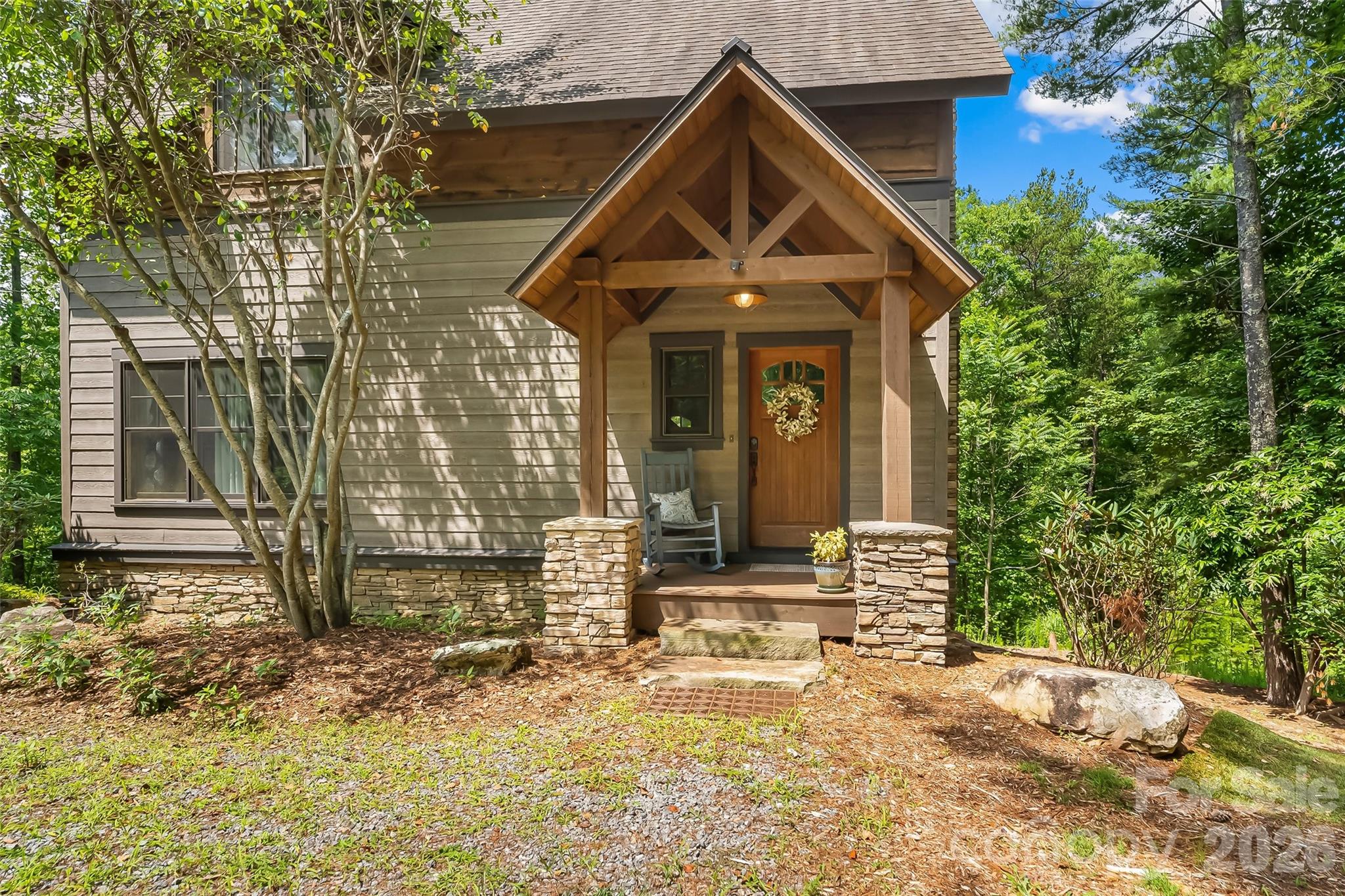 Looking for a part-time home that you can rent out in the desirable community of 1780?
Discover “The Treehaus” at Lake James — Your Private Escape in the Coveted 1780 Community!

Welcome to a mountain-modern retreat that captures the best of Lake James living. Nestled on 1.14 private acres surrounded by whispering pines, The Treehaus blends rustic charm with modern comfort — ideal as a year-round residence, vacation getaway, or income-producing short-term rental.
Enjoy a deeded boat slip (E-5) for quick access to the lake, and full membership to Camp Lake James, where amenities include pools, a fitness center, pickleball and tennis courts, hot tub, cantina dining, and miles of scenic trails connecting directly from your door.

Inside, soaring two-story ceilings and a cozy wood-burning (gas-log) fireplace create a warm great room perfect for gatherings. Step onto the spacious screened-in deck to entertain or relax with morning coffee amid nature’s peace.

The main-level primary suite offers a private en-suite bath and custom built-in wardrobe. Upstairs, a bedroom loft and guest suite provide comfort and privacy, while the lower level is all about fun — complete with a live-edge wet bar, bonus sleeping area, and full bath. There’s room to sleep up to eight guests, and every inch is designed for effortless enjoyment.

Fully furnished and truly turn-key, this home is ready for you to arrive and start living your lake dream. Roast marshmallows at the firepit, take your ATV to the Camp, or set out for a sunset cruise — The Treehaus makes it all simple. Home also provides an outdoor grill.

Whether you’re seeking a peaceful retreat, a smart investment, or both — The Treehaus at Lake James delivers the ultimate lake lifestyle.

Living and loving the Blue Ridge Mountains of Western North Carolina.