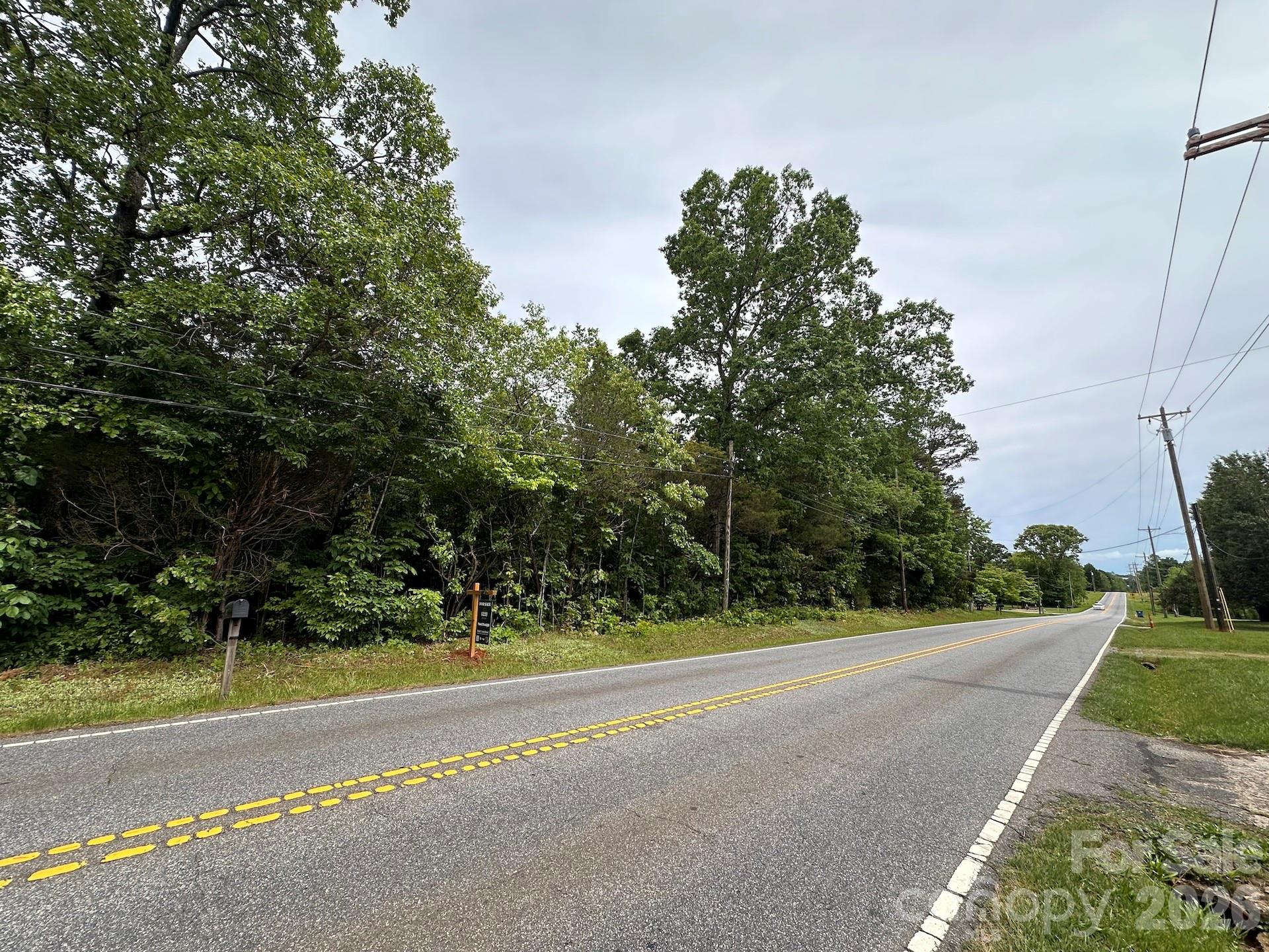 COME BUILD YOUR DREAM HOME! Beautiful Rectangular Lot. Great Location Between Conover and Hickory with NO CITY TAXES! Nearly 5 Acres! The Topography is Gorgeous and Rolling creating a Tranquil Holler with Mature Hardwoods scattered among Young Saplings yielding a beautiful Canopy with Privacy and Penetrating Sunlight! Soil testing should produce several location options for a standard septic system. Site has Catawba County Water available at Section House Road. Property could be subdividable or possibly even rezoned. Check with Catawba County for more information.