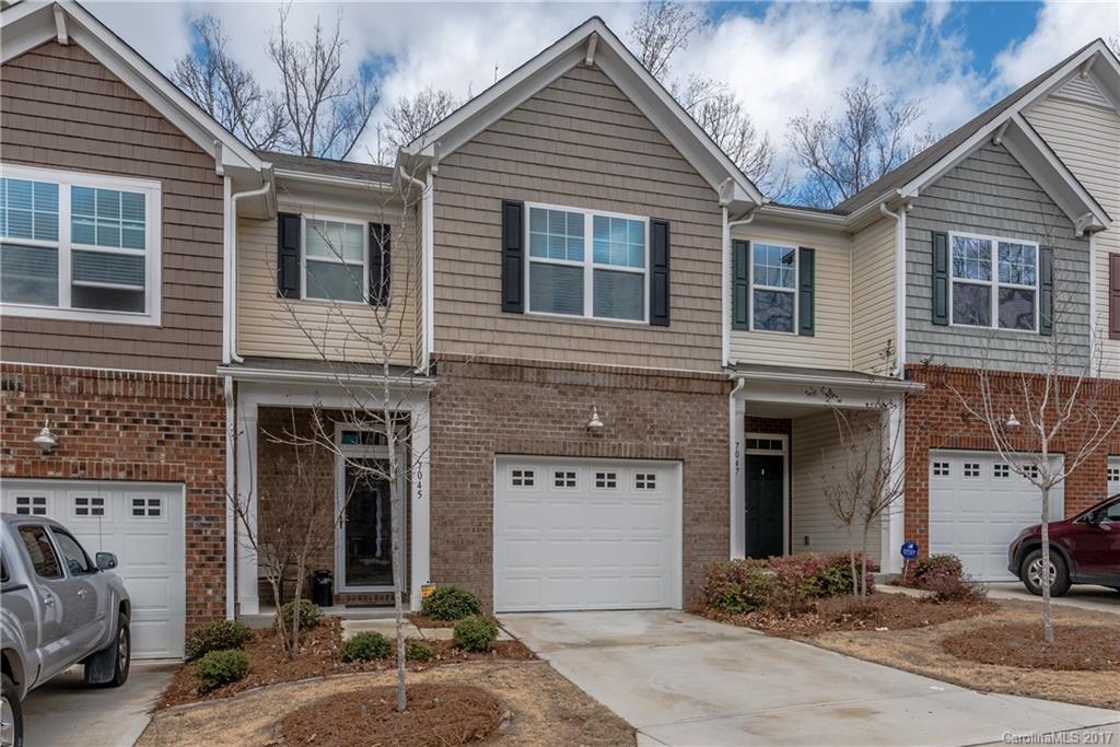 Shows like a model! 2 bed, 2.5 bath townhome with spacious open floorplan. Hardwoods on entire first floor. Fabulous kitchen with breakfast bar, granite, stainless appliances and gas range. $3,000 paver patio and landscape upgrade. Large master bedroom with sitting area, tray ceiling and walk-in closet. Master bath has dual sinks, tiled shower, garden tub and separate water closet. Seller has added ceiling fans and storm doors front and rear. Don't miss this one!