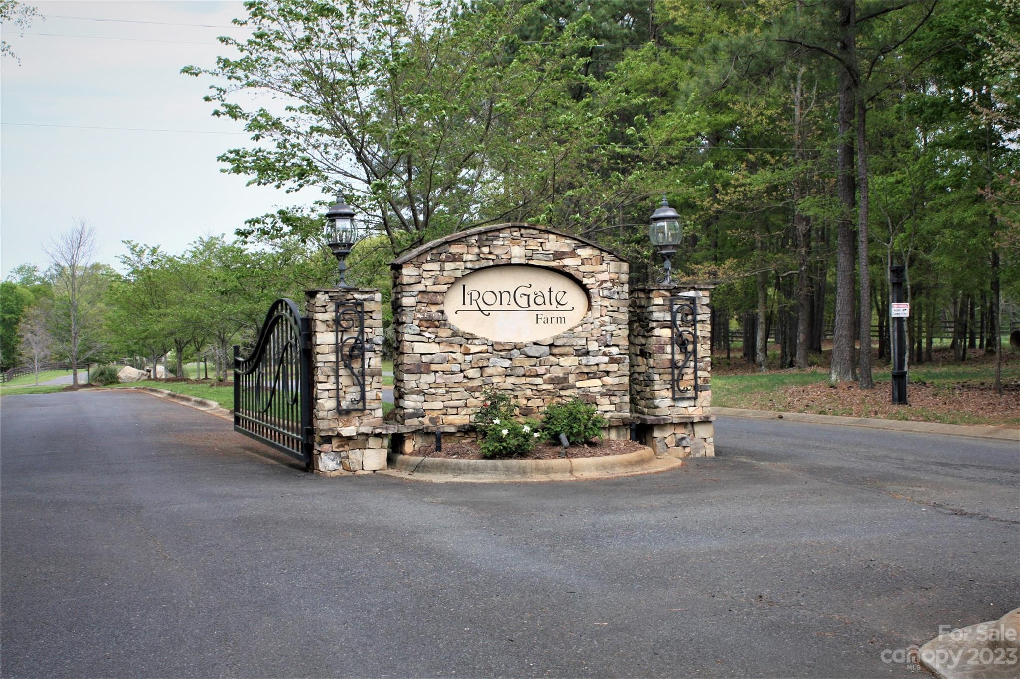 Looking for a lot on the water. Lot has frontage on the community pond and sits on a peninsula. This lot has the best water view in the community. The moment you arrive at Irongate Farm you'll feel the sense of calm and relaxation you get from the beautiful rolling pastureland and the impressive Irongate barn. Irongate Farm offers beautiful, wooded lots to choose from. All lots are over an acre in size creating an atmosphere of exclusivity, privacy, and country living. Irongate Farm residents will appreciate the wildlife and nature that surrounds this beautiful community. Walking trails and a large private fishing pond. Located in the award-winning Clover SC School District. Irongate Farm is minutes away from Charlotte, Gastonia, Pineville, Matthews, Gastonia, Belmont, Rock Hill, and Lake Wylie. Choose one of our approved custom home builders to build that new home you have been dreaming about.