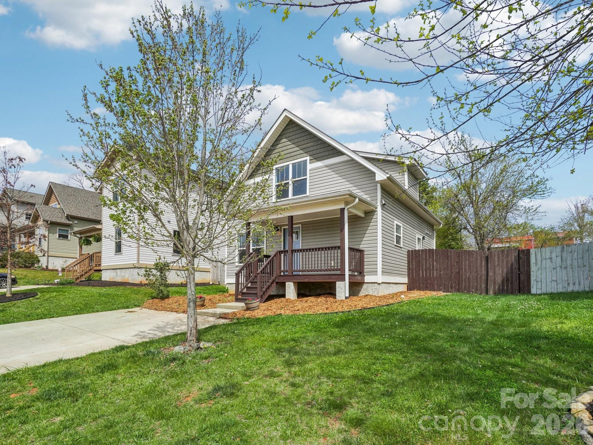 New Price-exceptional value in a fantastic location! Welcome to 17 Yarrow Meadow Rd! Lillie Farm Cove is ideally situated just minutes from vibrant downtown Weaverville, where you'll find an array of restaurants, charming shops, and local breweries. Downtown Asheville, historic Biltmore Estate, and numerous scenic hiking trails are all within a short drive.
 The Charming front porch invites you to relax and unwind, making it the perfect spot to enjoy your morning coffee or an evening beverage as you take in your surroundings
  Inside, large windows let in an abundance of natural light throughout the main level with a bright and open floor plan designed for comfortable living and effortless entertaining. Custom built-in shelving adds both style and functionality while the inviting kitchen with granite countertops and stainless appliances offers a warm gathering space for family and friends. The primary bedroom on the main level includes an ensuite bathroom, providing convenience and a relaxing retreat.
  Upstairs you'll find two cozy light-filled bedrooms along with a full bathroom- perfect for guests, a home office, or a dedicated space for hobbies, yoga or meditation.
  Step outside to discover a spacious fenced backyard filled with possibilities. Whether you envision a lush garden, a safe haven for pets or an outdoor entertaining area, this versatile space is ready to bring your ideas to life.
Don't miss this opportunity to live in such a beautiful home in a sought after community!