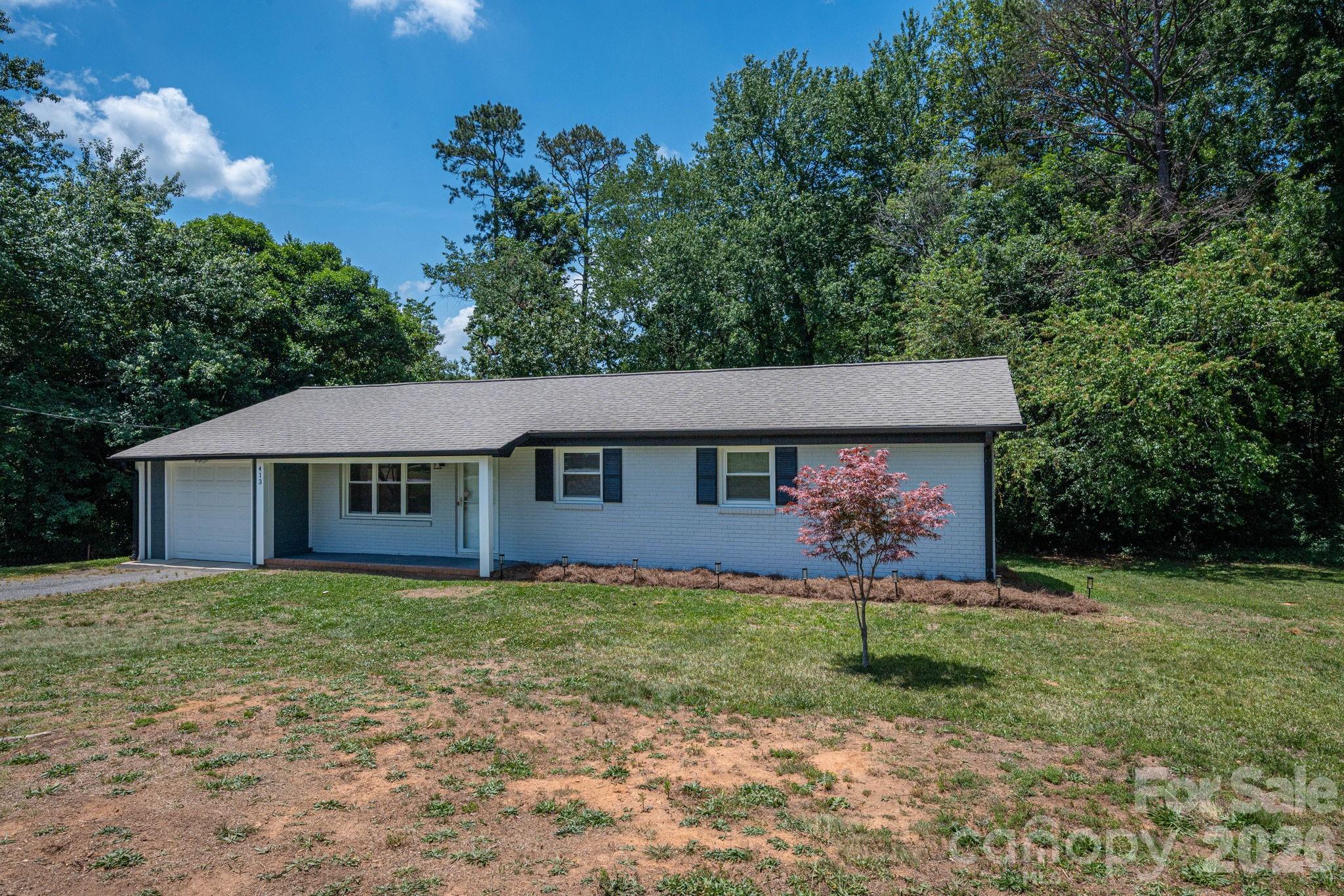 Experience the perfect blend of privacy, comfort, and convenience in this well-maintained home. Inside, you’ll find beautiful hardwood floors, updated windows that bring in natural light, and fresh paint throughout the interior and exterior for a clean, refreshed feel. The exterior brick has been professionally stained, giving the home a modern, updated curb appeal. Peaceful mornings or relaxing evenings await on the screened-in patio overlooking the serene surroundings. The property also offers great space for hobbies, storage, or motorcycle enthusiasts looking for room to enjoy their passion. Major updates include a new roof in 2021 and a new water heater in 2025, giving added peace of mind for years to come. Conveniently located just minutes from Moss Lake and under 15 minutes to Catawba Two Kings Casino, this property offers privacy while still being close to recreation, dining, and entertainment.