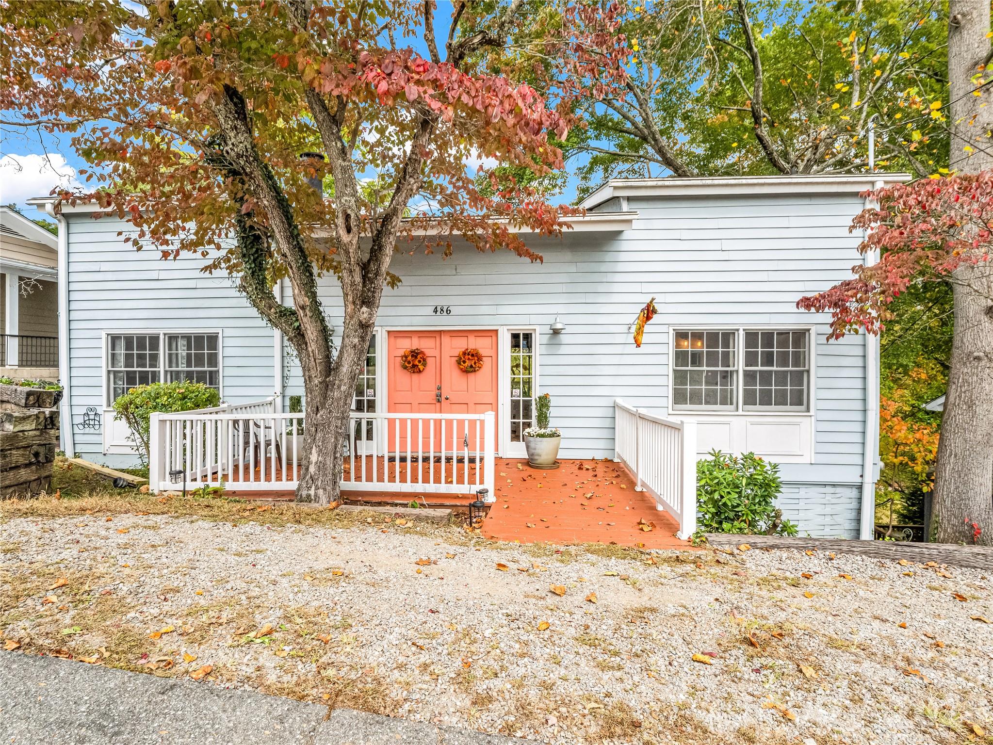 Nestled in the heart of Western North Carolina's historic Lake Junaluska district, this cottage, full of vintage charm, is the quintessential mountain retreat just steps from the water’s edge.

Currently a short-term rental, the property balances serene living with investment potential. Residents and guests enjoy lake access and low HOA fees, along with premier community amenities like a scenic walking trail, outdoor pool, tennis courts, and a playground. The property is conveniently located just 45 minutes from Asheville Regional Airport.

Inside, there are 3 bedrooms each with a private ensuite bathroom for maximum comfort and privacy. The sun-drenched, open-concept main floor reveals a dramatic two-story living room with soaring ceilings and a rustic wood-burning fireplace, the ideal sanctuary after a day of hiking, biking, or paddling. For winter enthusiasts, the Cataloochee Ski Area is less than 30 minutes away.

Whether you're seeking a peaceful personal sanctuary or a turnkey investment, this rare gem captures the best of Western North Carolina living. Contact us today to schedule a private showing between guest reservations.
