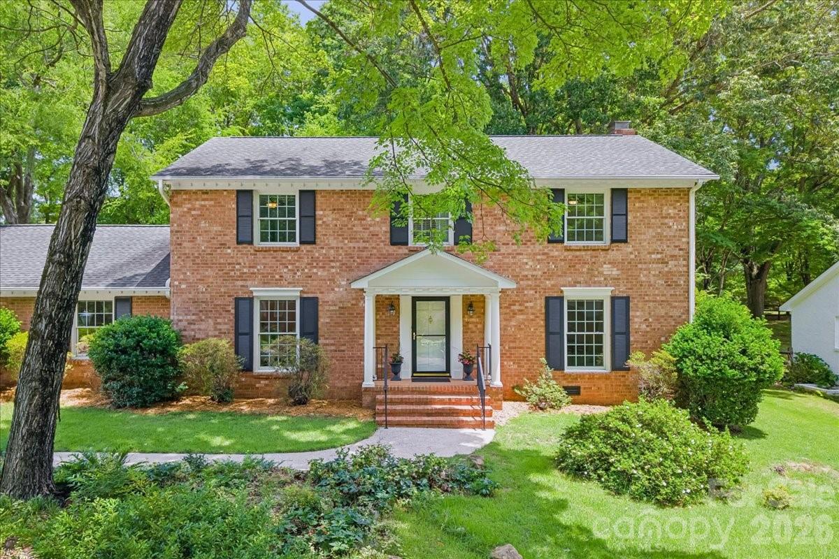 Step inside this classic Thomasson-built, two-story brick beauty, perfectly nestled in the heart of Stonehaven on one of the neighborhood’s most serene and picturesque streets. Timeless charm meets everyday livability in this well-maintained home, set on a large, flat, fully fenced yard with a generous patio—ready to be customized for lounging, dining, and entertaining. A two-car attached garage and ample storage add everyday convenience.

Original hardwood floors grace most of the main level, creating warmth and character throughout. New light fixtures in the dining room, kitchen, and foyers introduce modern yet classic touches. The spacious kitchen anchors the home and offers plenty of room for entertaining and future personalization, featuring quartz countertops, stainless steel appliances, a gas cooktop, and fresh paint. A laundry room, half bath, and large storage closet complete the first floor.

Just off the kitchen, the family room—originally a screened-in porch—was thoughtfully converted in the 1980s into a comfortable living space, creating easy flow for gatherings and everyday living.

With three distinct living areas, including one with a gas-log fireplace and built-in cabinets, the home offers wonderful flexibility. Whether you envision a home office, family room, game room, playroom, or cozy den, the layout easily adapts to your lifestyle.

Upstairs, the freshly painted primary suite features a walk-in closet and an ensuite bath. Three additional spacious bedrooms surround the open hallway, complete with newly cleaned carpet. The two full bathrooms on the second level retain their vintage charm and offer a fantastic opportunity to update and make them your own.

Located in an established neighborhood known for its tree-lined streets, strong sense of community, and convenient access to shopping, dining, and schools, this home offers classic appeal, solid bones, and endless potential. A rare opportunity to settle into Stonehaven and make it truly your own.

**Additional photos will be uploaded Saturday afternoon**