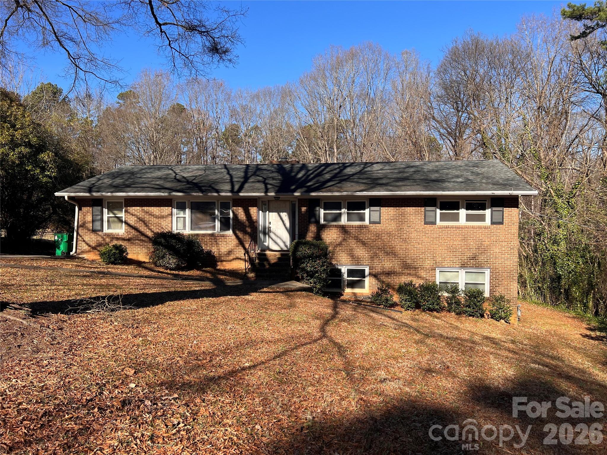 Full renovation take-over opportunity in Charlotte (28214), located approximately 5 minutes from CLT Airport. Property sits on a private cul-de-sac 0.83-acre lot and was originally built in 1972. Current footprint is 3,144 sq. ft. with a 1-car garage. Home has been fully demoed and reframing begin to accommodate a more functional floor-plan. Work was fully permitted, engineered, and includes warranty documentation. A new subfloor has also been installed. Property is currently framed for a 4-bedroom, 3.5-bath layout with a bonus room and additional flex space. Utilities include city water and private septic. Septic system was scoped with no reported issues. This is a true construction project being offered in its current condition.