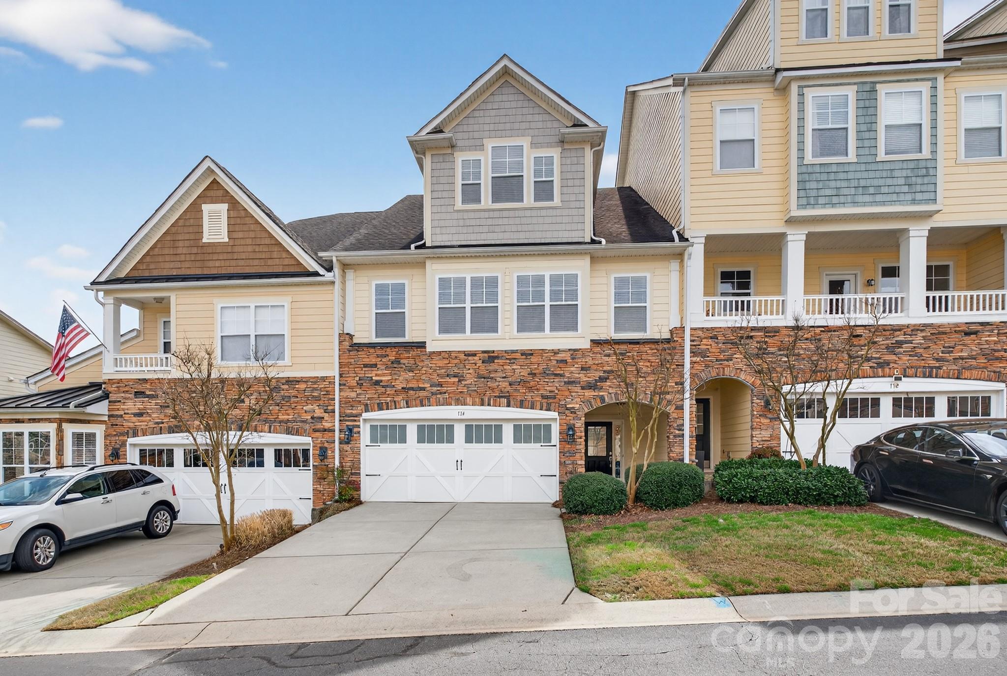 Welcome home to this beautifully property in highly sought-after Tega Cay featuring top-rated Fort Mill School District schools! This spacious home offers thoughtful upgrades and incredible community amenities perfect for both relaxing and entertaining.

The HVAC system was installed in 2020, along with brand new luxury vinyl plank wood flooring in the primary bedroom and second-floor hallway. A Halo 5 whole-house carbon filtration system was added in 2023 for enhanced water quality. The HVAC unit is conveniently located in the garage cubby for easy access.

The inviting living room showcases a stunning floor-to-ceiling stone veneer gas fireplace with built-ins and pre-wiring above the mantel for your TV setup. The fireplace is being sold as-is, as the seller has never used it.

The kitchen is designed for gathering and functionality with a large island featuring bar-top seating, an abundance of cabinetry, pantry storage, wine rack, and hanging glass rack.

Retreat to the spacious primary suite complete with a private balcony, oversized walk-in closet with custom cabinetry and folding island, and a luxurious en-suite bath featuring dual vanities, soaking tub, and separate shower. Upstairs also includes two additional bedrooms and a large laundry room with cabinetry for extra storage.

The third floor offers a massive bonus room with a walk-in closet and access to an additional balcony — perfect for a media room, office, gym, or guest retreat.
